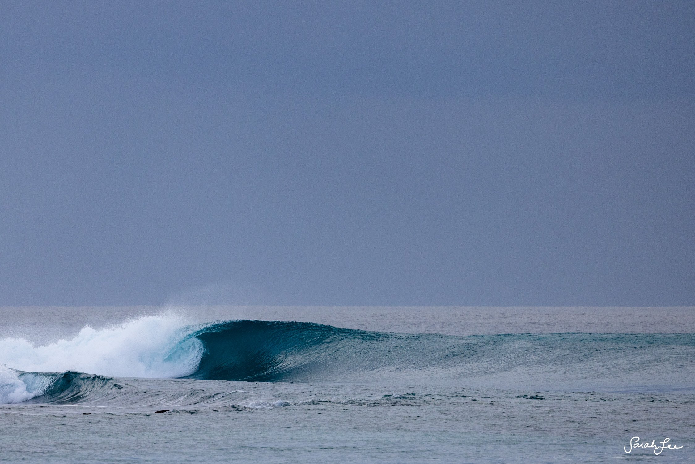 A barreling left in the Maldives