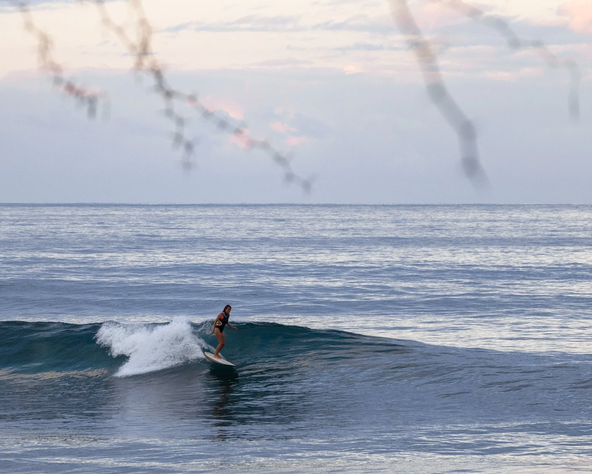  Anna Guduaskas longboarding somewhere on Oahu 