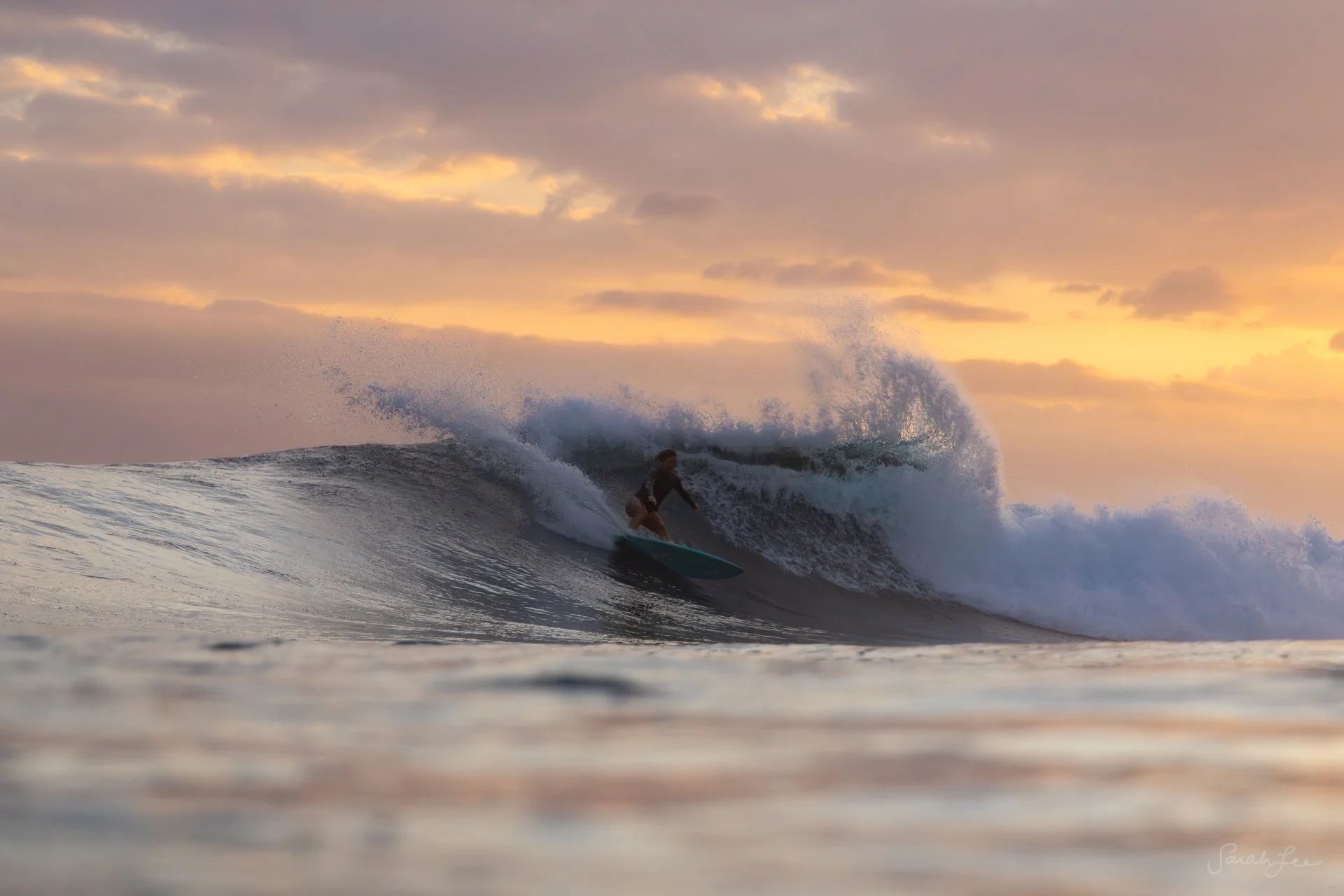  paige alms surfing into the sunset in fiji 