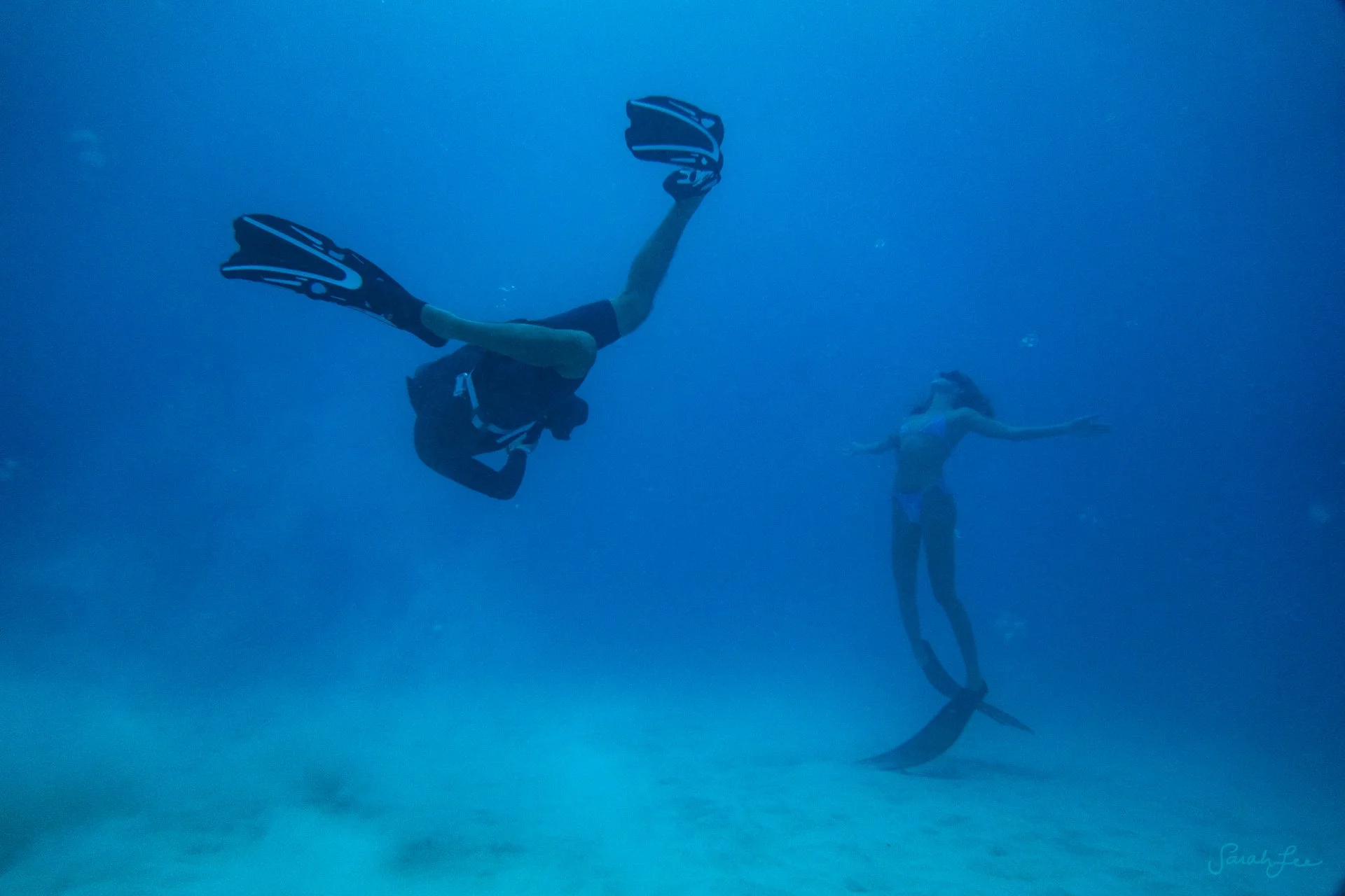  chris funada and elena aoki underwater on the big island 