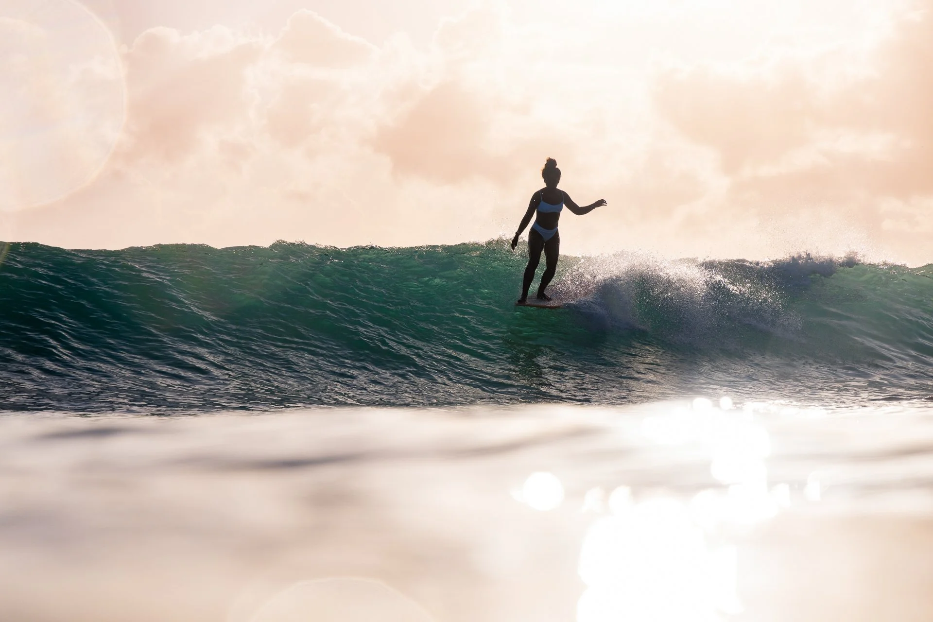 Afro-Latina Surfer Nique Miller shot for Billabong Womens by female surf photographer Sarah Lee in Waikiki