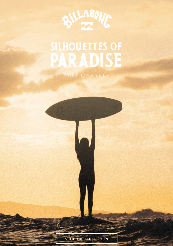 Silhouette of a woman holding a surfboard above her head on the beach at sunset with clouds and the ocean in the background. Text overlay includes "Billabong," "Silhouettes of Paradise," "Surf Capsule," and "Shop the Collection."