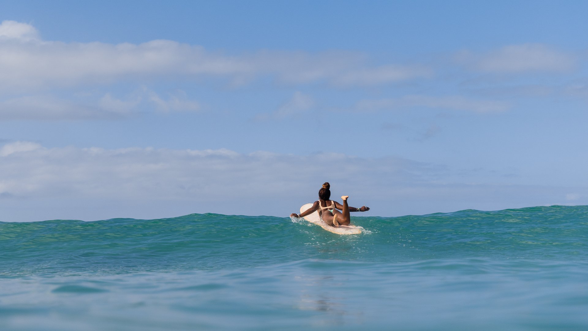 Afro-Latina Surfer Nique Miller shot for Billabong Womens by female surf photographer Sarah Lee in Waikiki