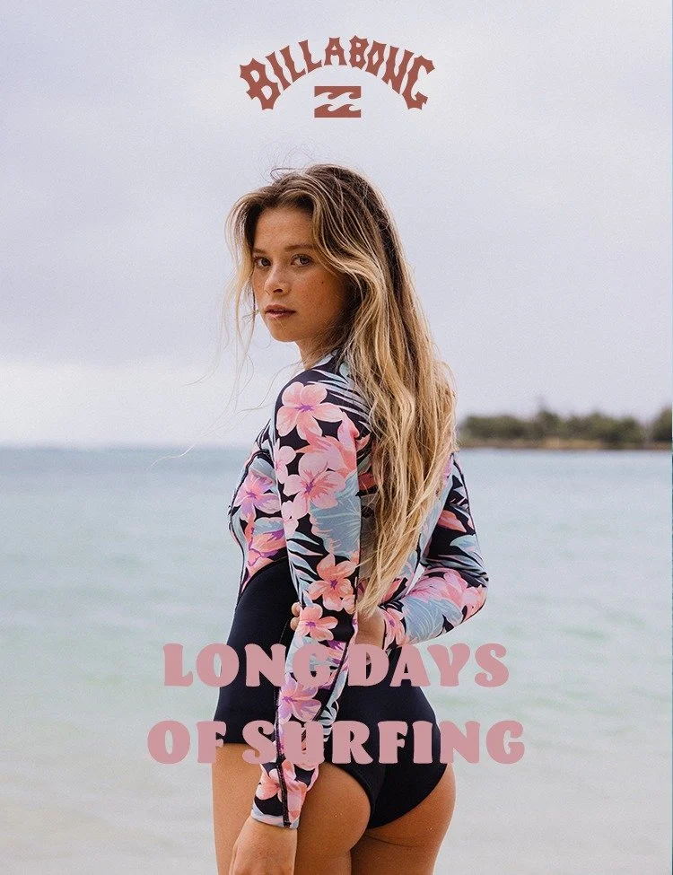 A young woman standing on the beach wearing a floral long-sleeve rash guard and black bikini bottom, with ocean and cloudy sky in the background, and text overlay reading 'Billabong' and 'Long Days of Surfing'.