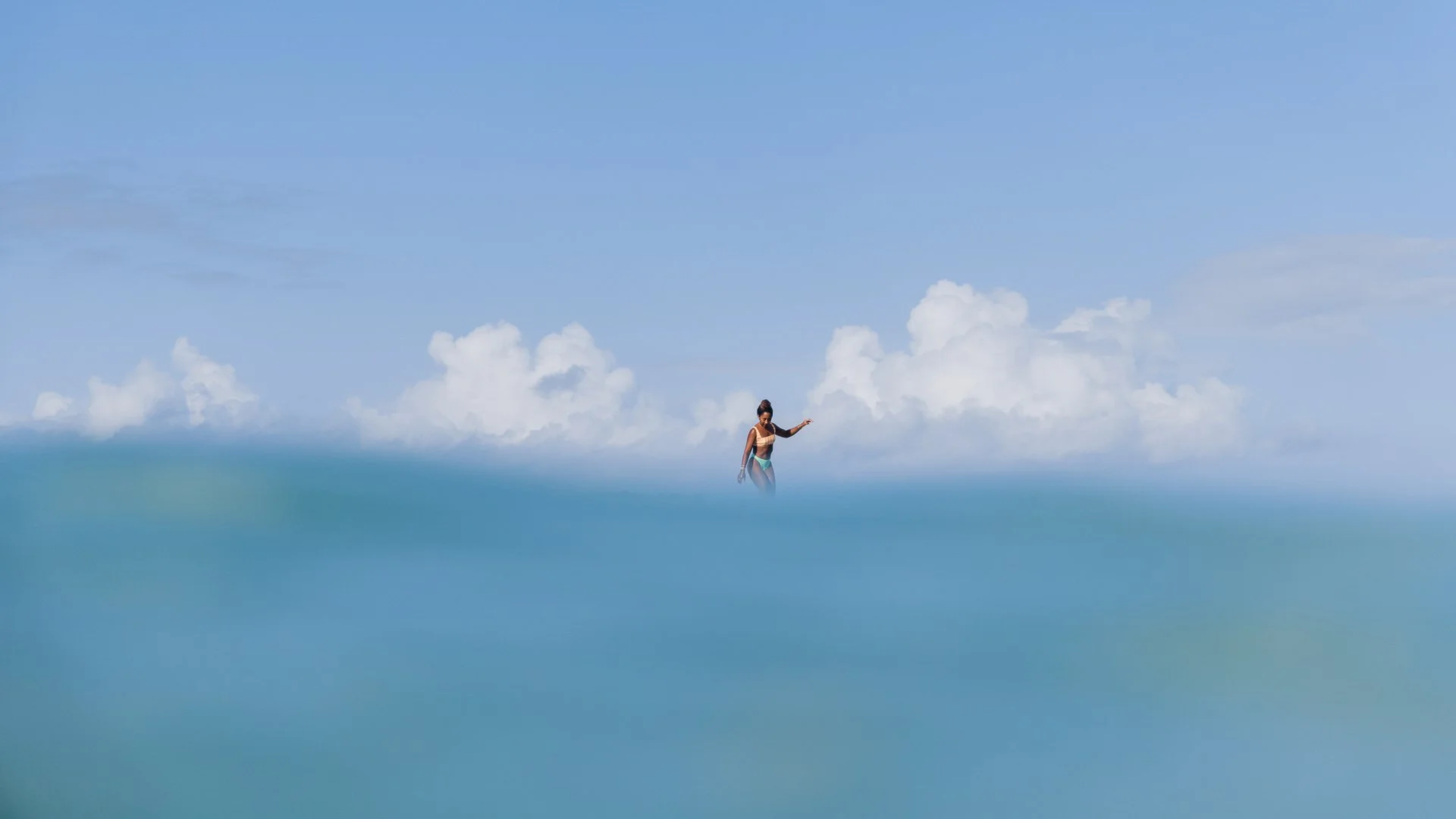 Afro-Latina Surfer Nique Miller shot for Billabong Womens by female surf photographer Sarah Lee in Waikiki