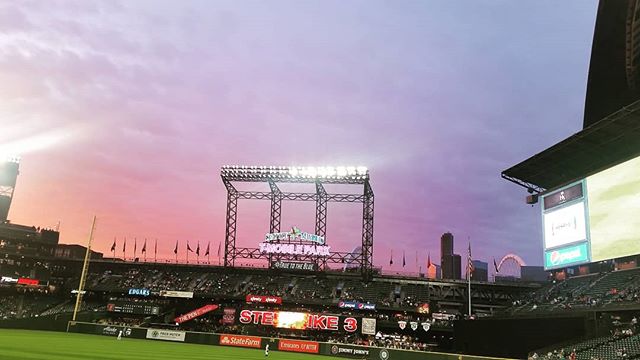 A beautiful sunset as a backdrop for the pink and blue sign of T-Mobile Park. .
.
.
.
.
.
.
.
.
#baseball #mariners #truetotheblue #seattle #sunsets #T-MobilePark #Seattle