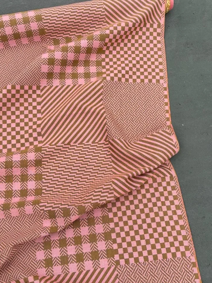 The Patchwork upholstery fabric is a continuation of the Patchwork throw, launched last year. A contemporary interpretation of the classic patchwork quilt, a tribute to craftsmanship, time, and care. 
Firt picture - patchwork upholstety fabric in pin