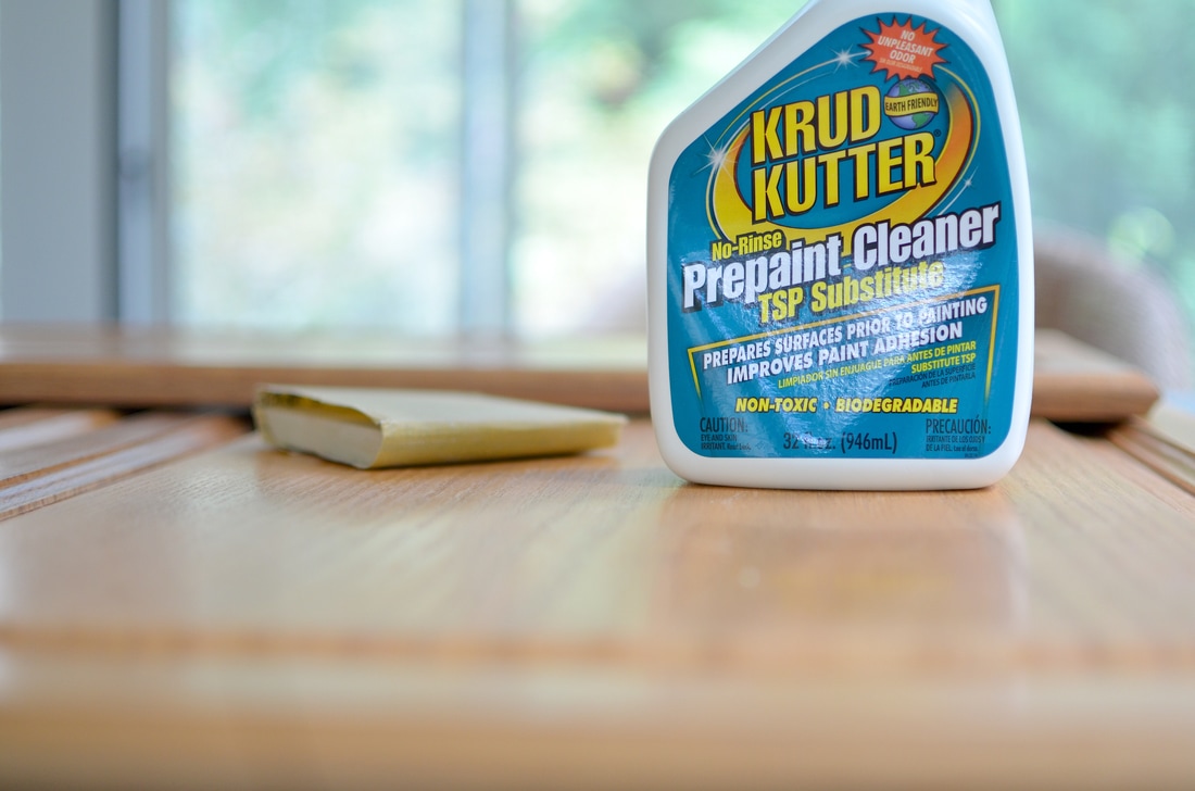 After everything dried I did a light sanding and then sprayed and wiped down all the doors with this product to get it ready for primer. I had never used it before but I just followed the directions on the bottle and it worked just fine.