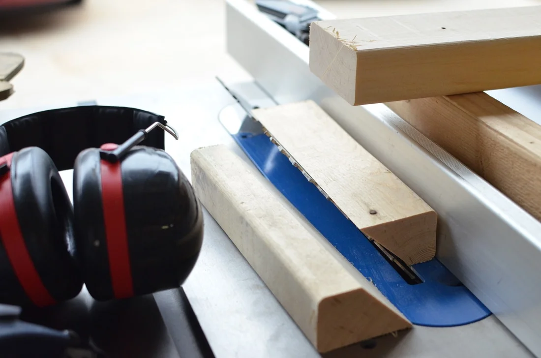 We made simple 45 degree braces to go in the space from the wide oak board to the ceiling. This was so the moulding would have something solid to nail to.