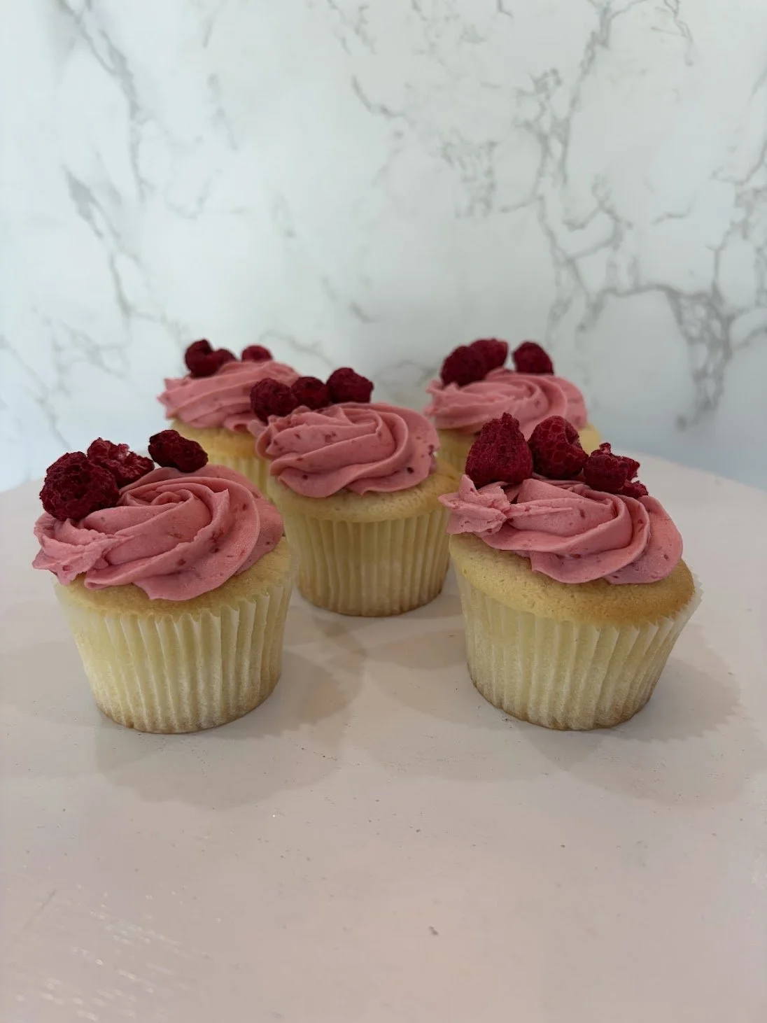 White Almond Raspberry Cupcake