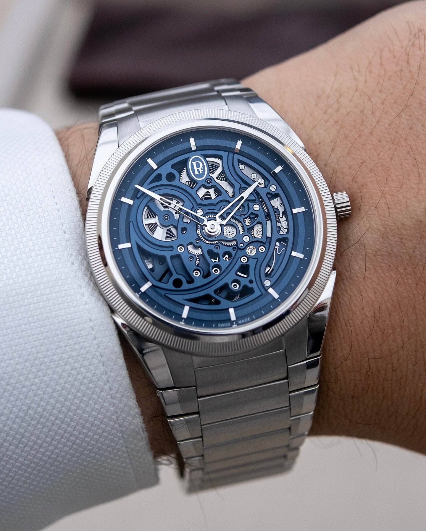 One of my favorite pieces from Watches &amp; Wonders was the @parmigianifleurier Tonda PF Skeleton in platinum. Though the design is not new, the combination of platinum case and bracelet and blue openworked dial just works so well.