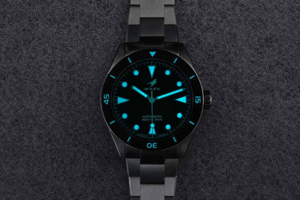 The Diver One Abyss photographed on mid-grey felt, the dial reading darker than the shadows around the case