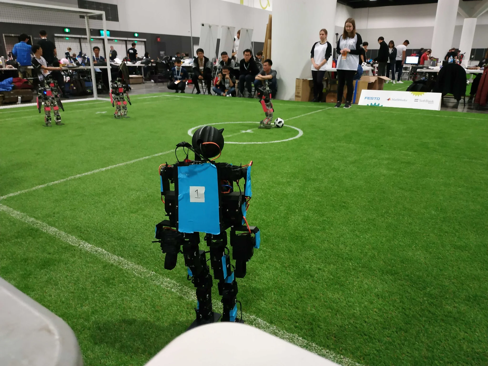 Excitement mounts as humanoid robot teams prepare to play soccer at RoboCup 2019.