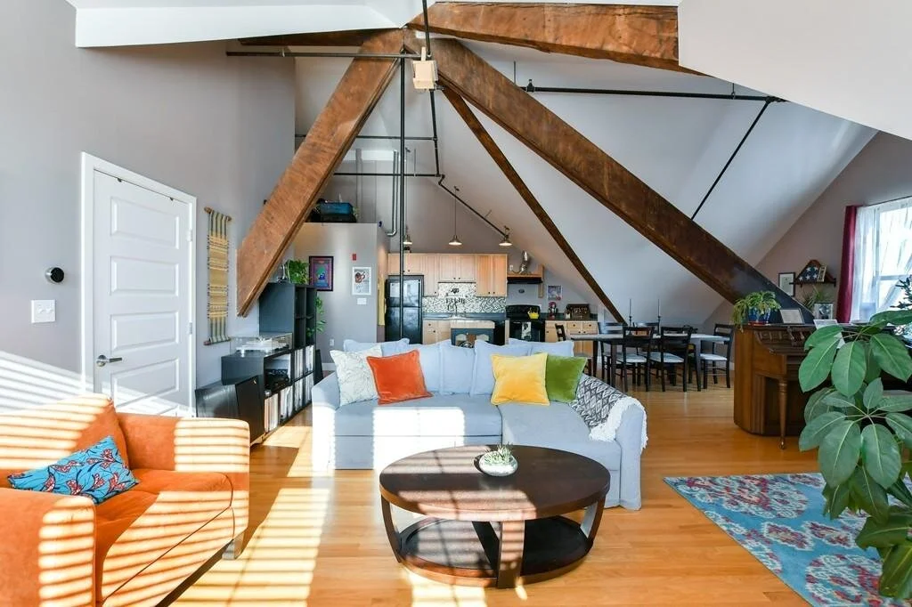 Want a unique space? Get into this Tudor Revival converted schoolhouse for $425,000.