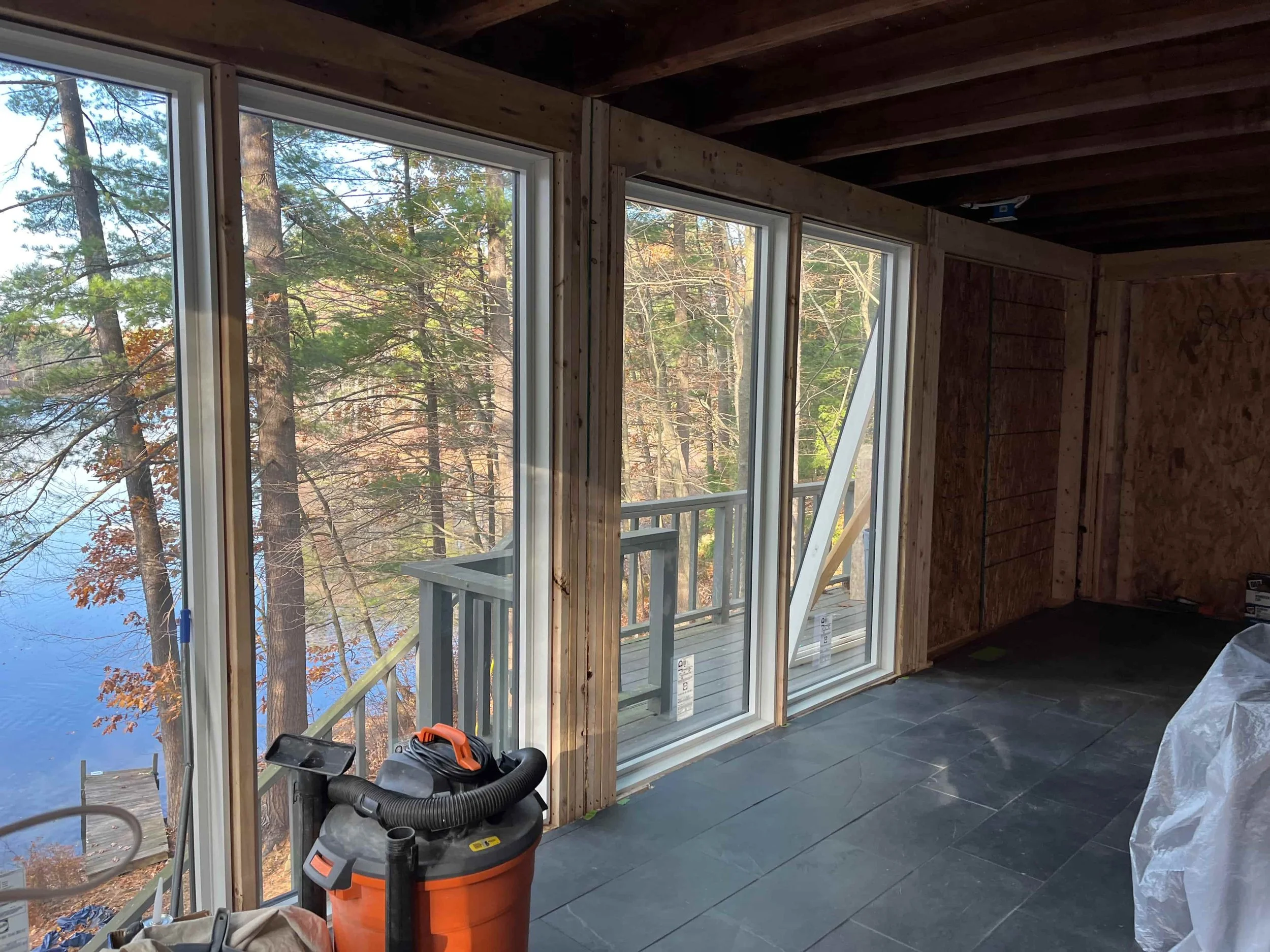Four floor-to-ceiling windows with water views