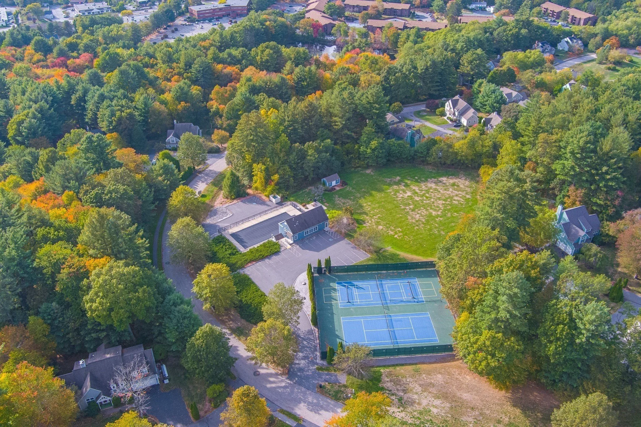 A development with single-family homes that share amenities