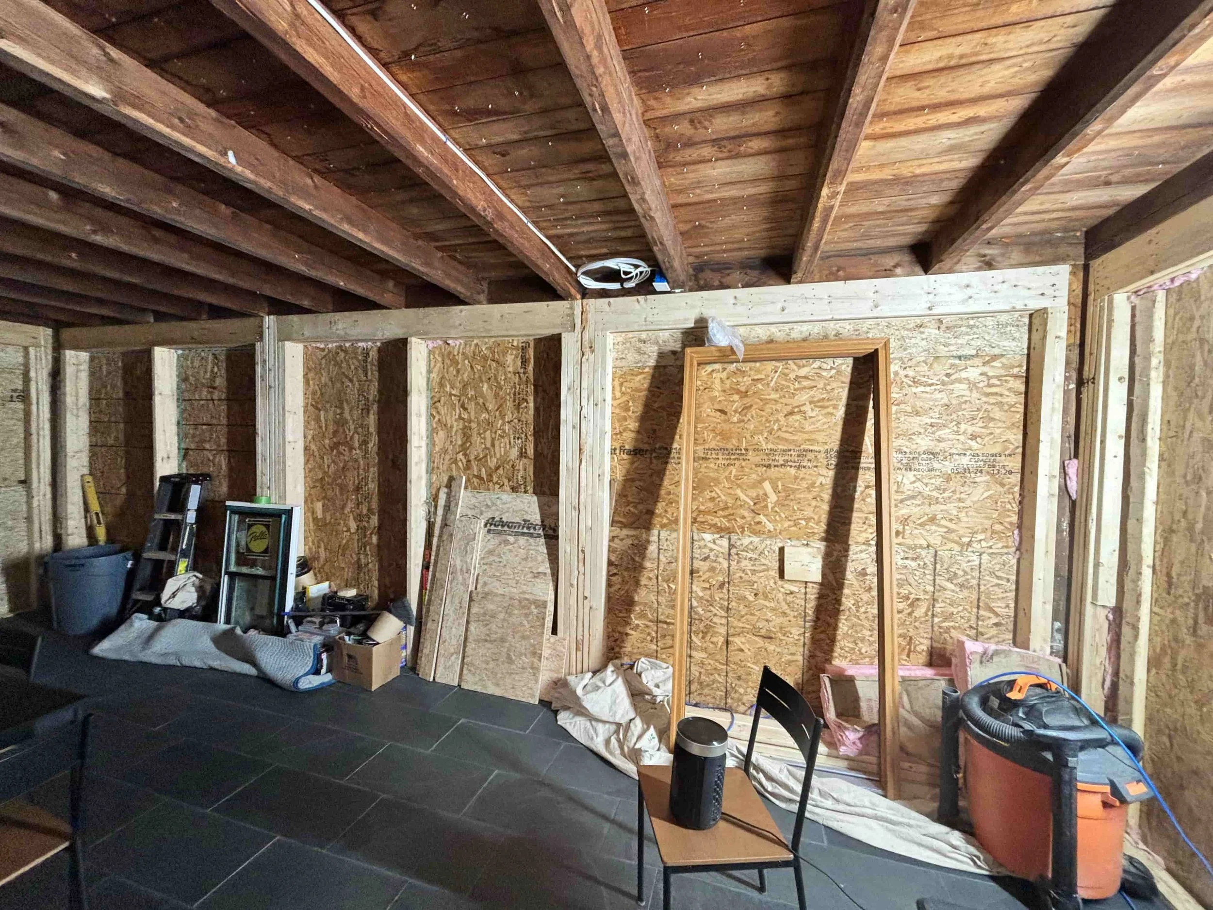 Complete darkness as all sections of window frames got boarded up