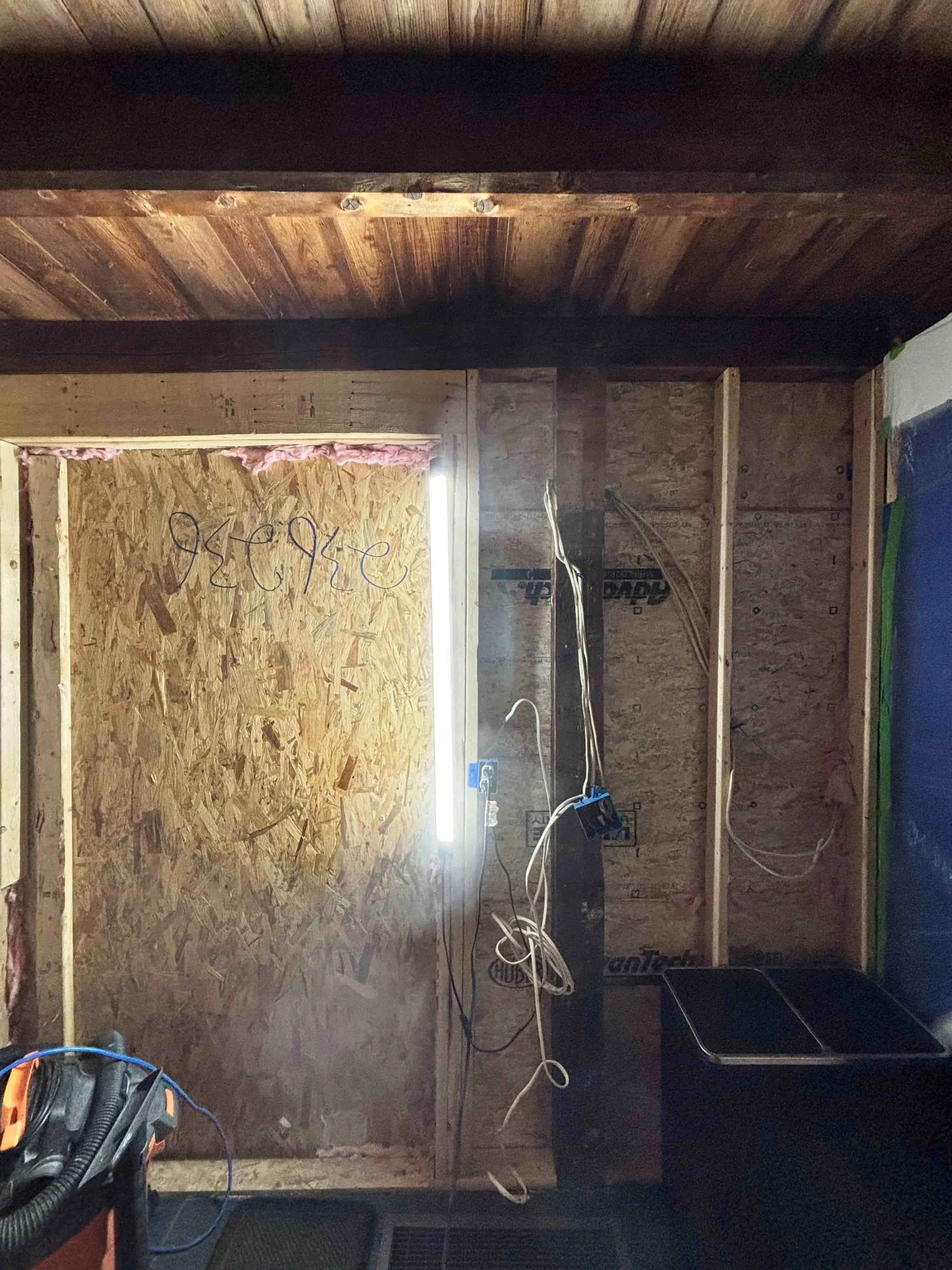 Boarded up window frame