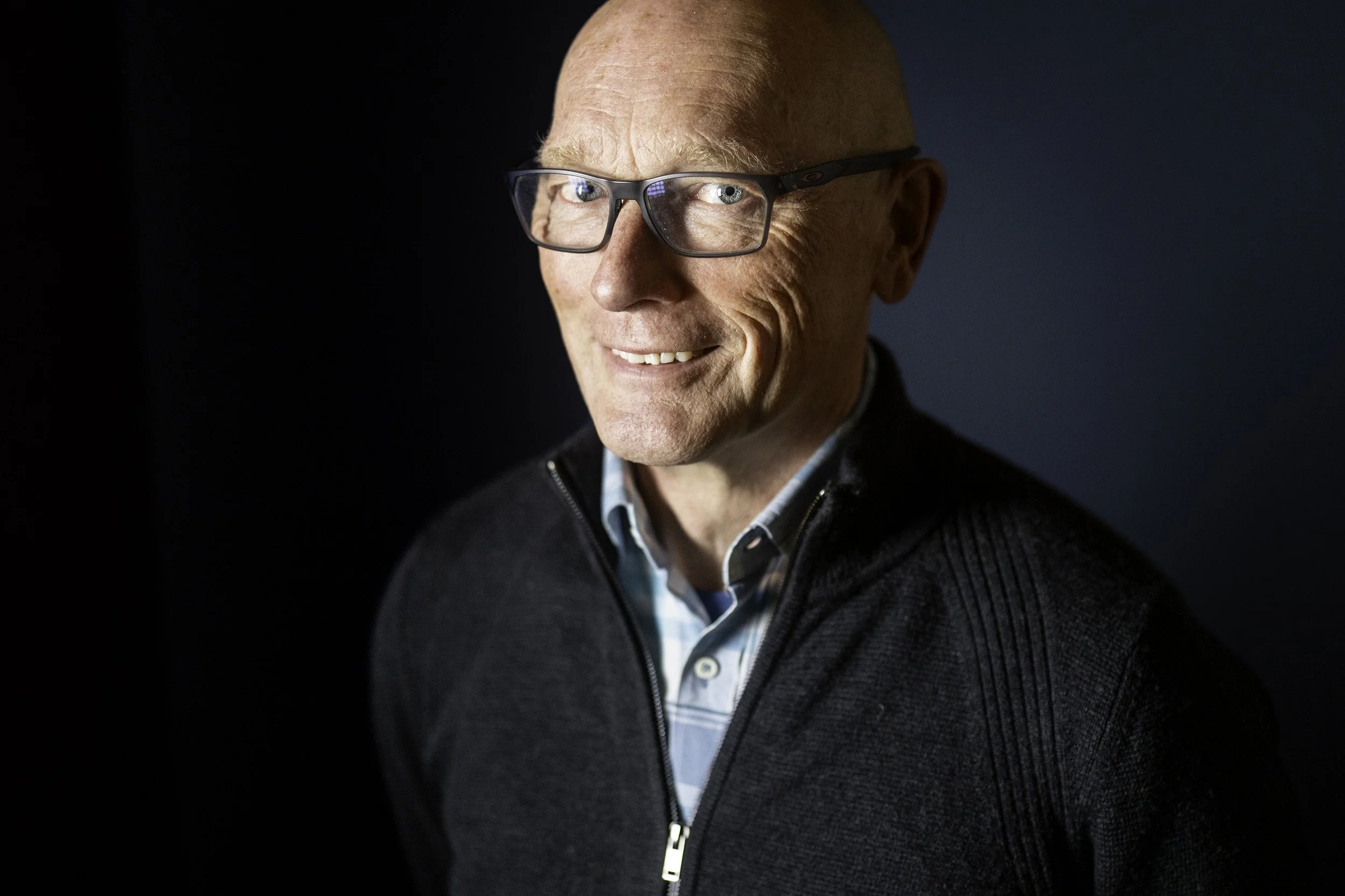 Winemaker Michael Hall up close, in colour, stares at the camera.