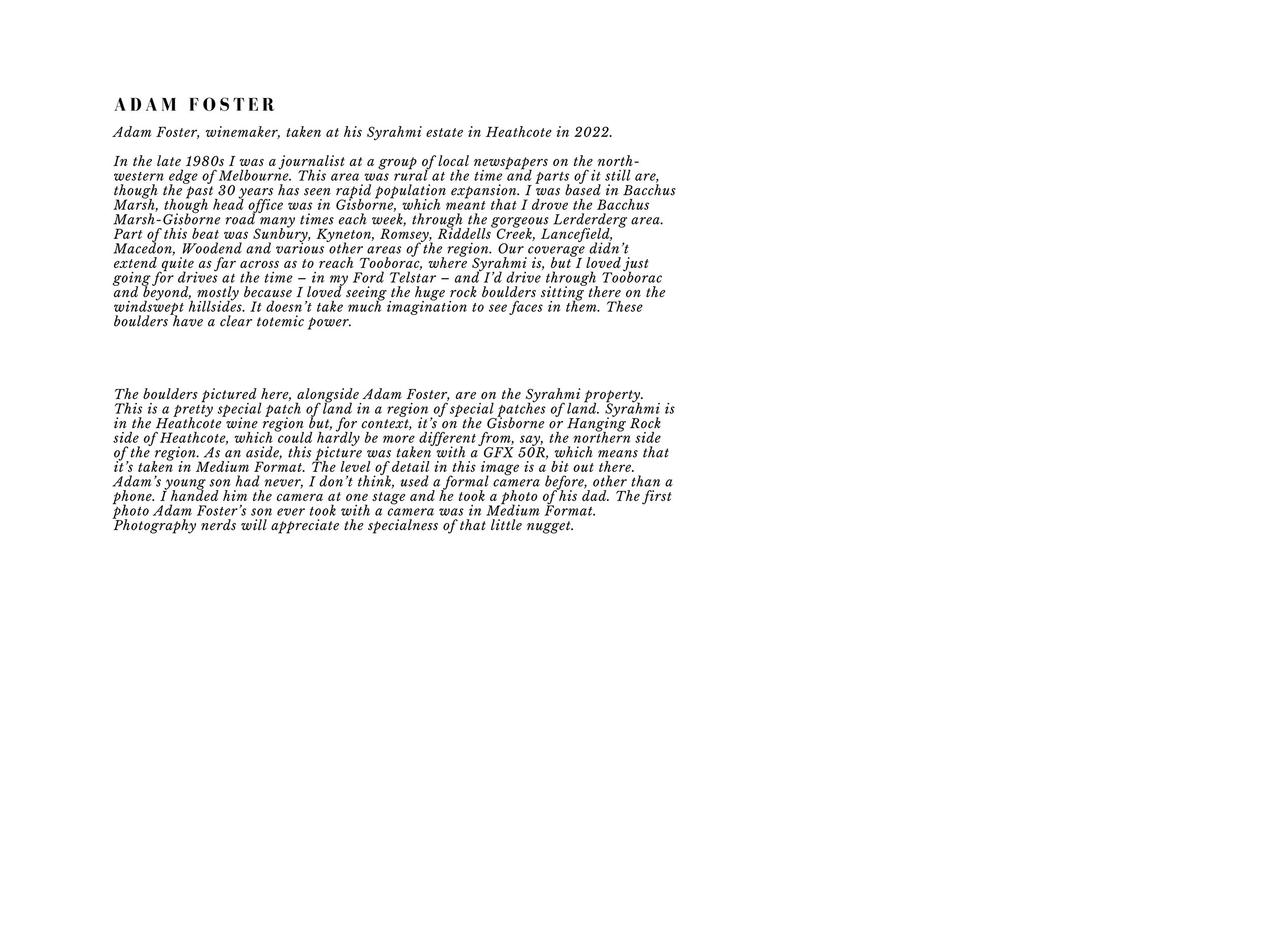Photograph of a typed page with text about Adam Foster and his Syrahmi estate in Heathcote, Australia, including personal anecdotes and description of boulders on the property. The page is predominantly white with black text, formatted with headings 