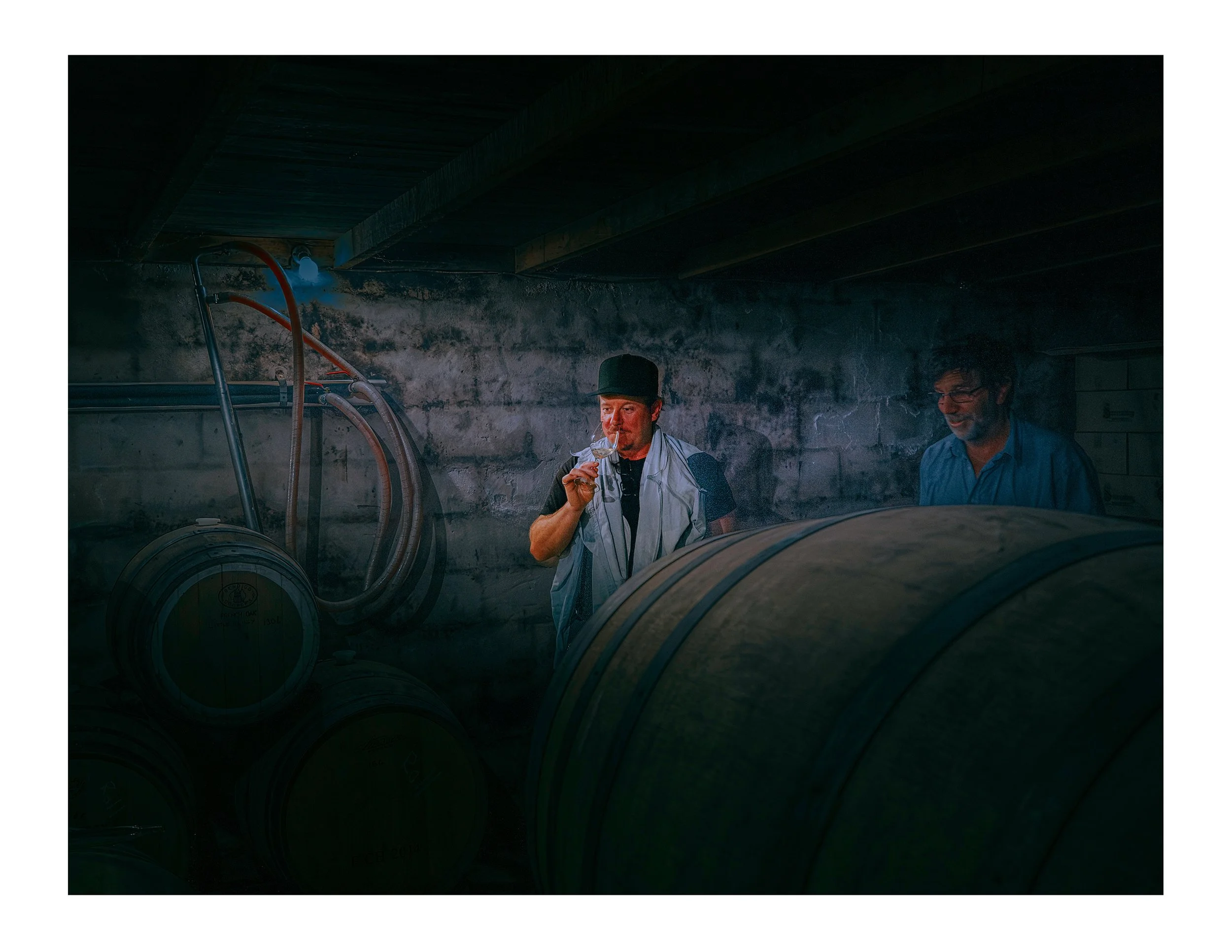 This is a picture of wine writer Mike Bennie and Beechworth winemaker Barry Morey in the Sorrenberg cellar. This photograph was taken by photographer Campbell Mattinson.
