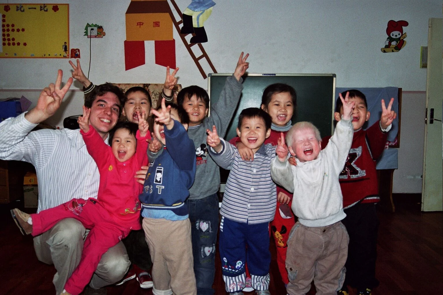 Orphanage kids cheering.jpeg