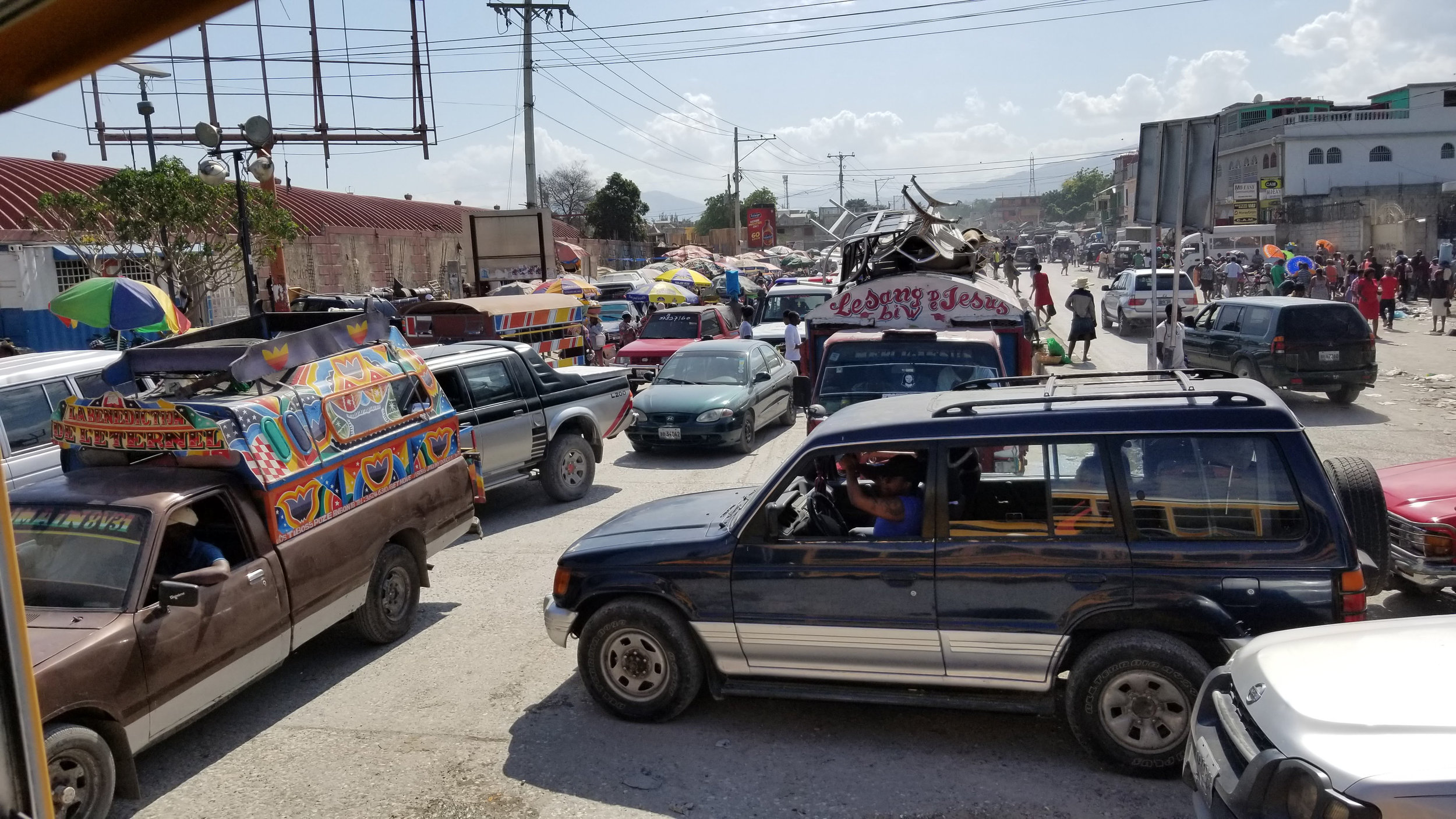 Traffic in Port-au-Prince is unbelievable in every sense of the word. Unbelievable that there can be so many cars with places to go. And unbelievable that one can actually get anywhere navigating through it all!