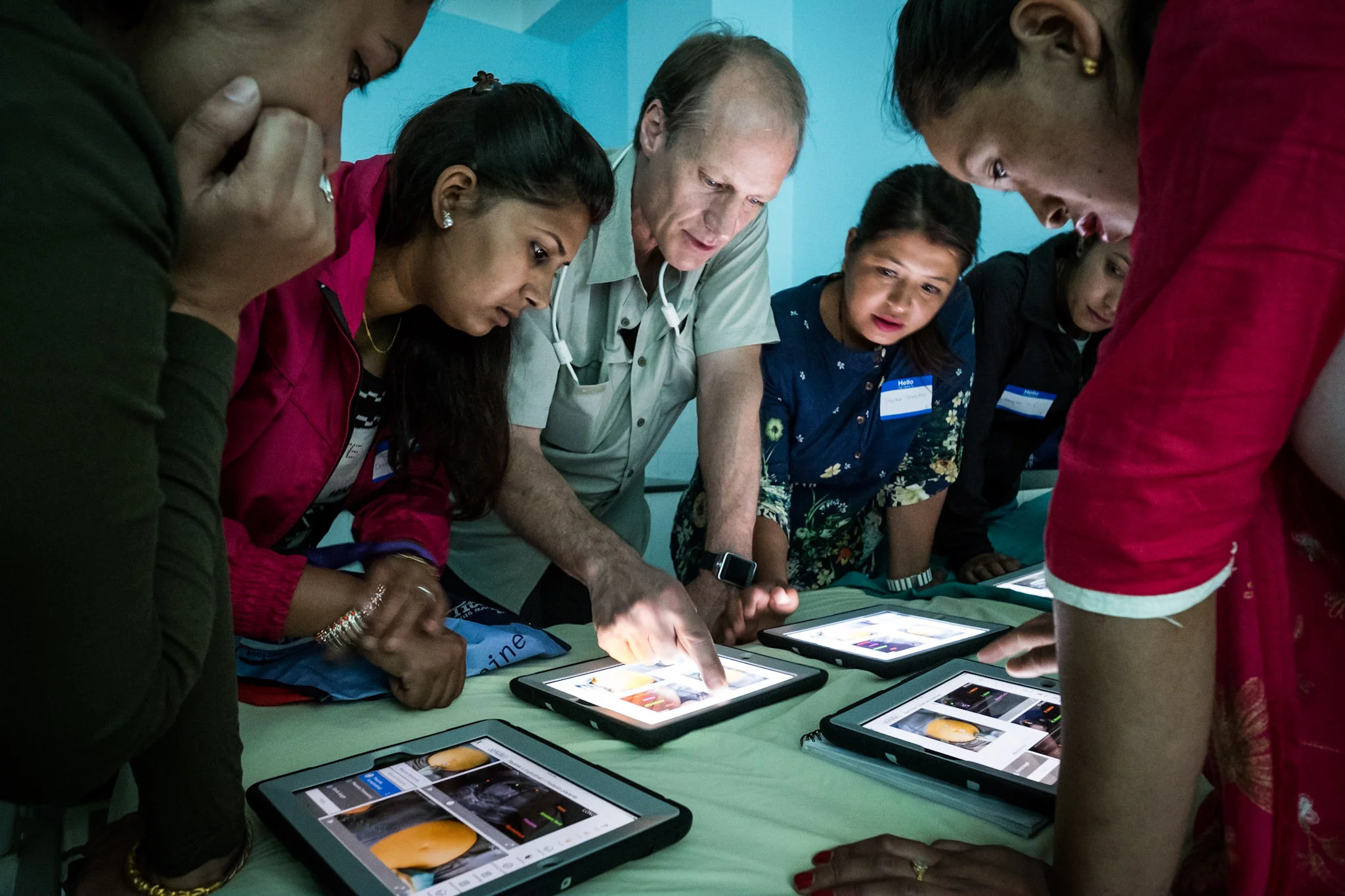 Dr. Gronseth introduces Nepalese midwives to the obNAV educational software.