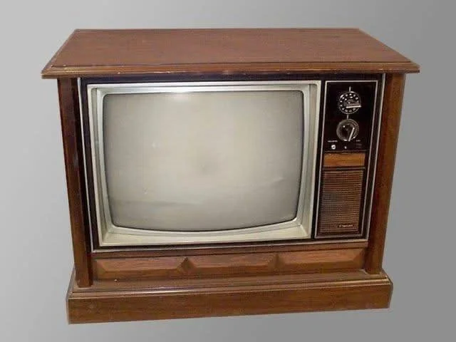 😊. It's 1970 and we just got a brand new console TV.  Best TV ever.  They will never make anything better than this. 
The TV guide - also a real treasure.