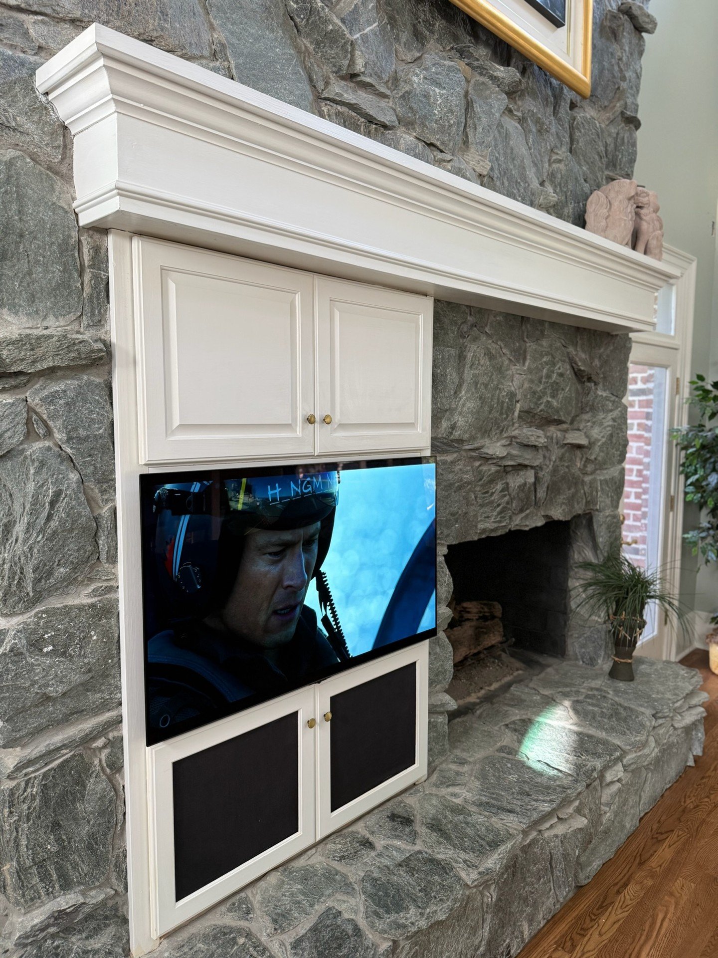This is not your typical tv placement but on a cold day, being close to the fire just makes sense. 🔥