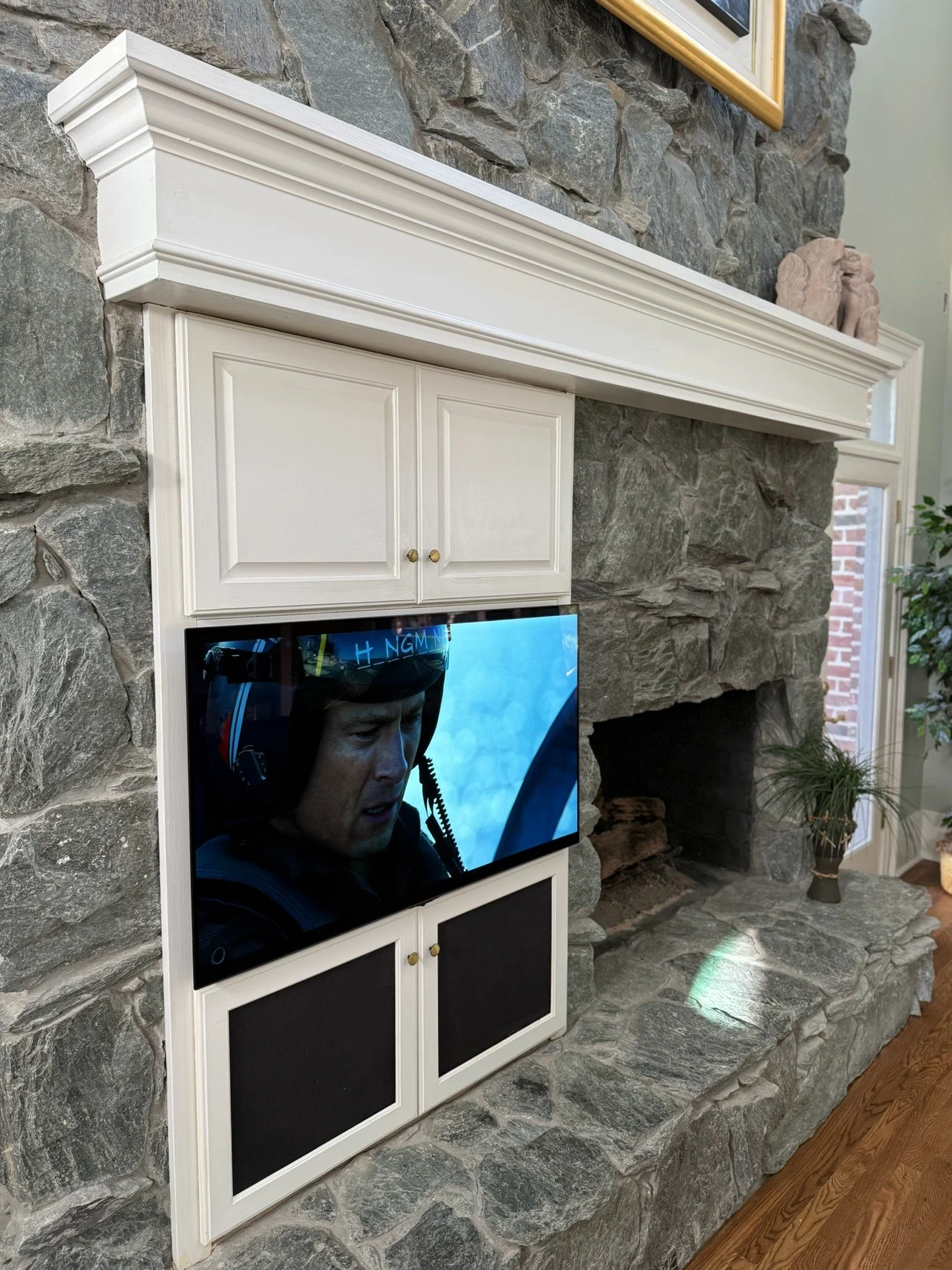 This is not your typical tv placement but on a cold day, being close to the fire just makes sense. 🔥