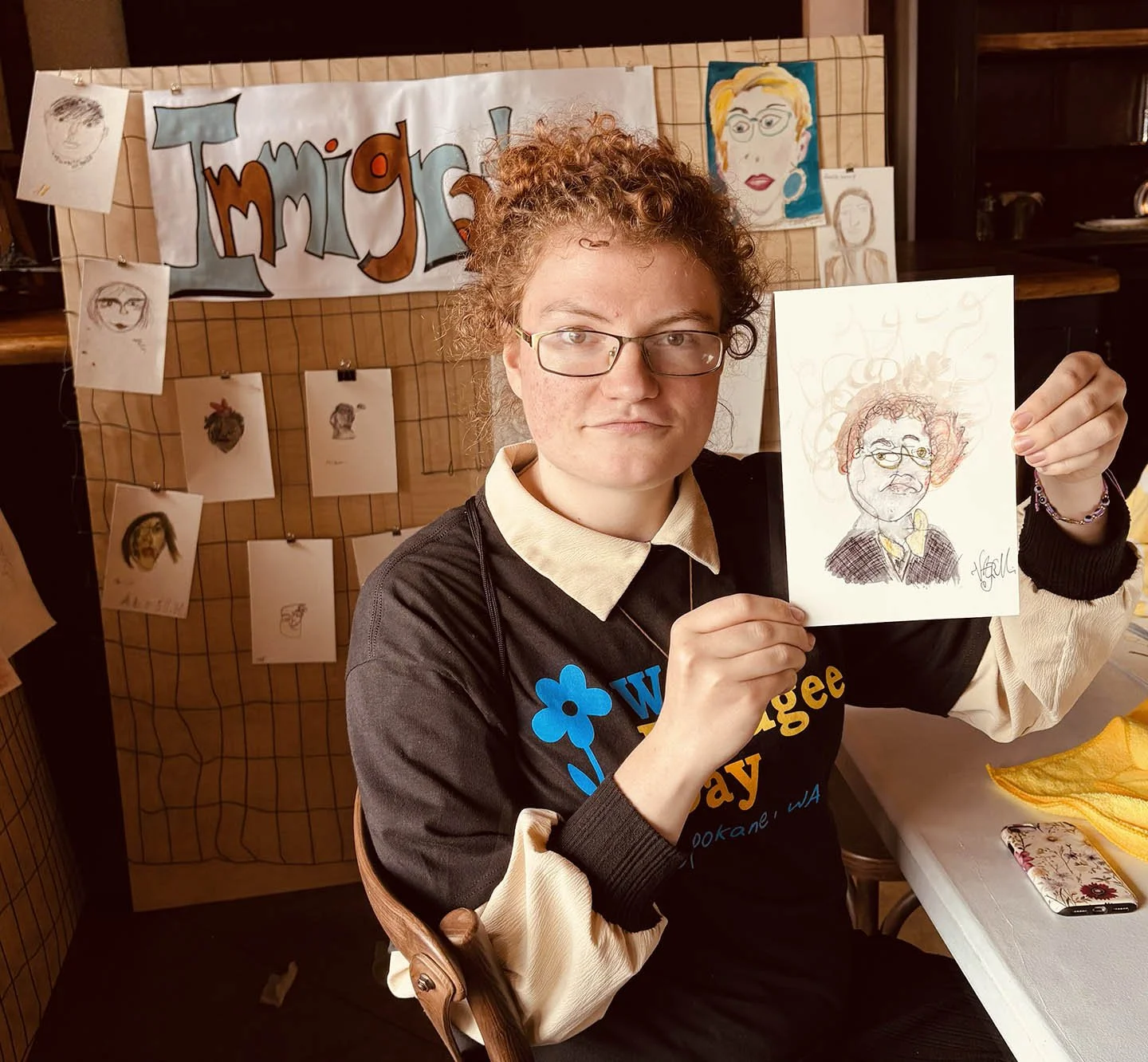 person with drawing.jpg