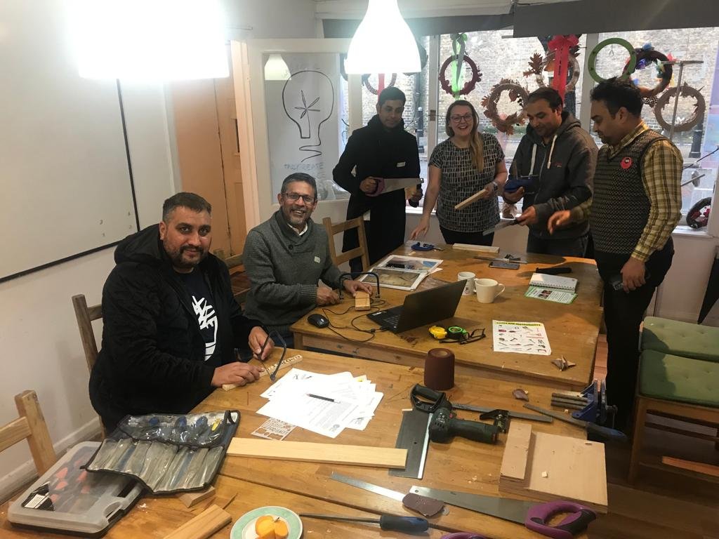 Group of participants doing woodwork 2.jpeg