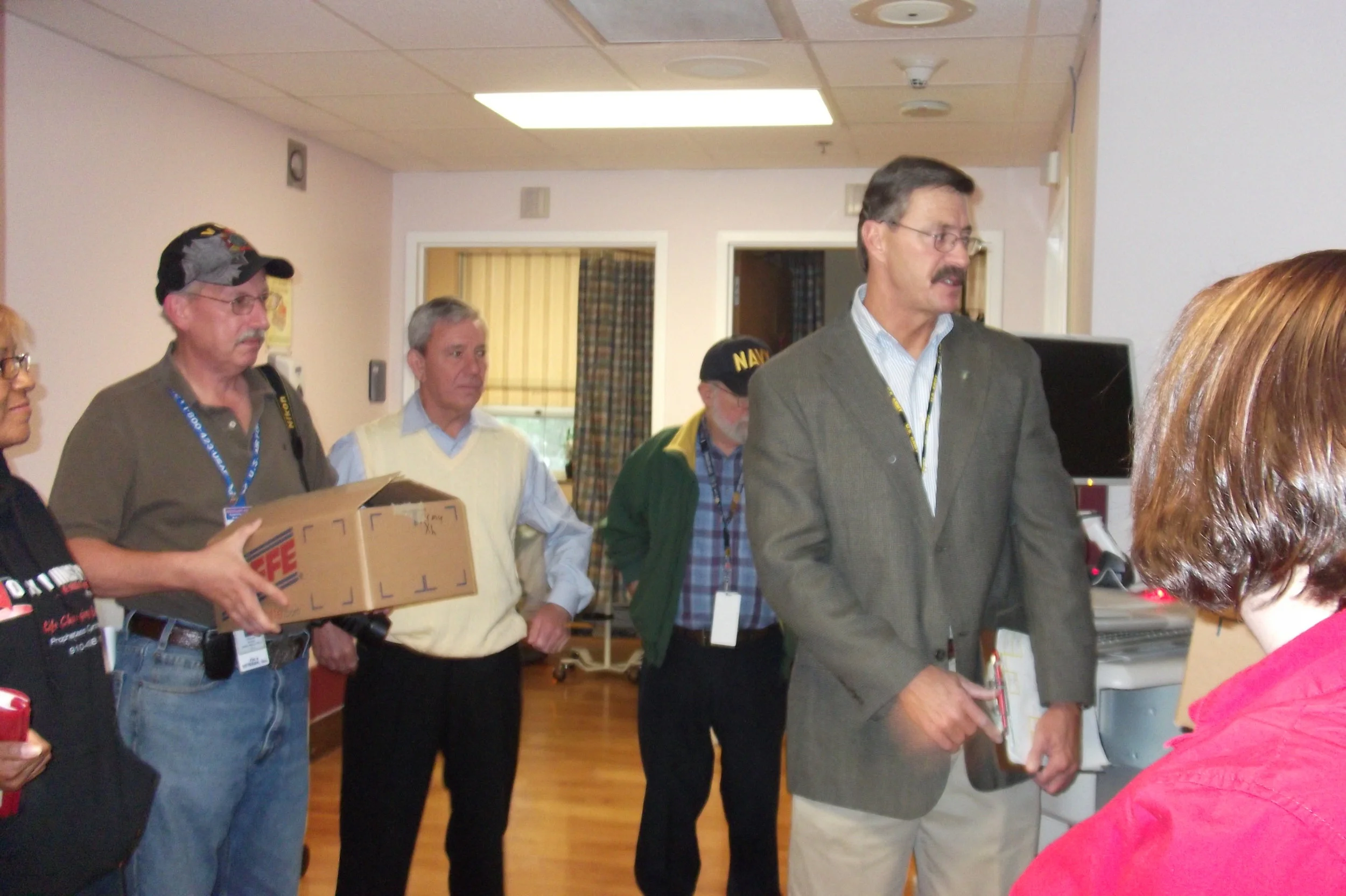 Dan Kelly patient introductions and gift distribution.JPG