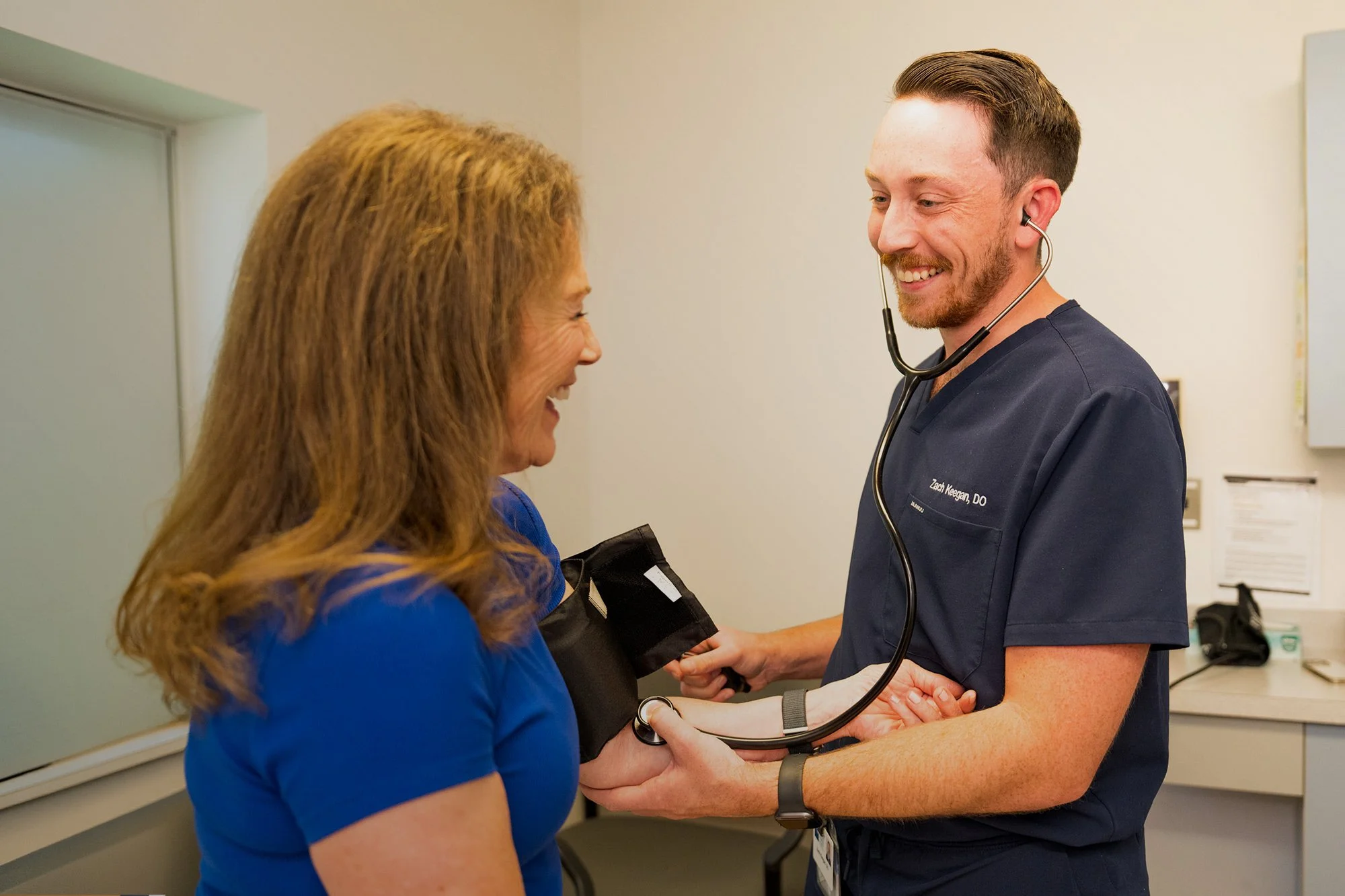 doctor-examining-at-patient-Lincoln-Family-Medicine-Center.jpg