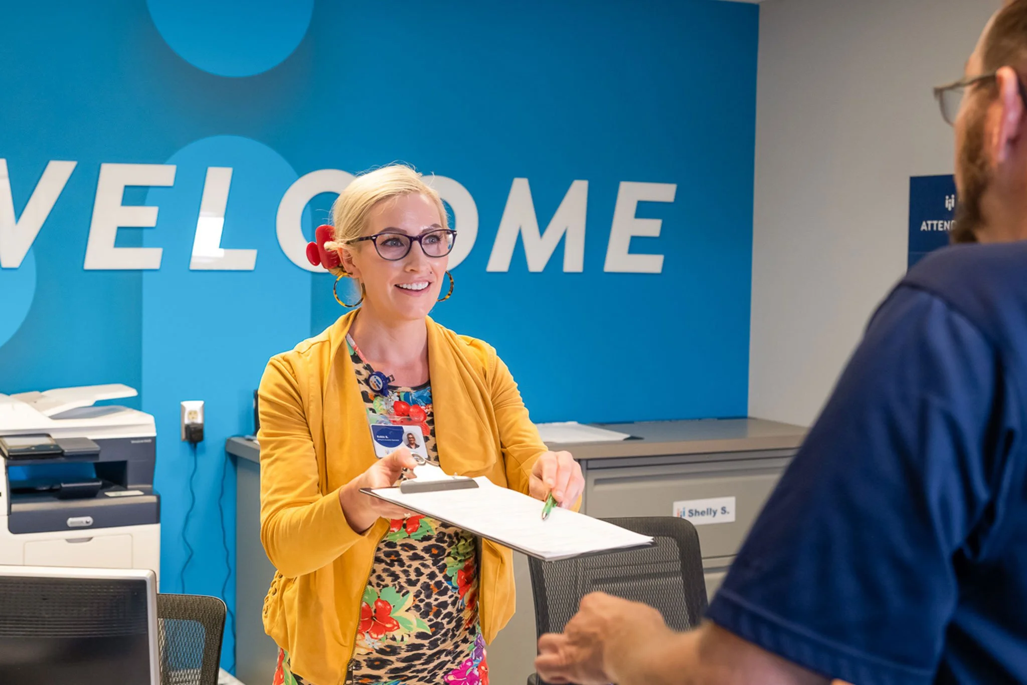 Patient-check-in-front-desk-welcome.jpg