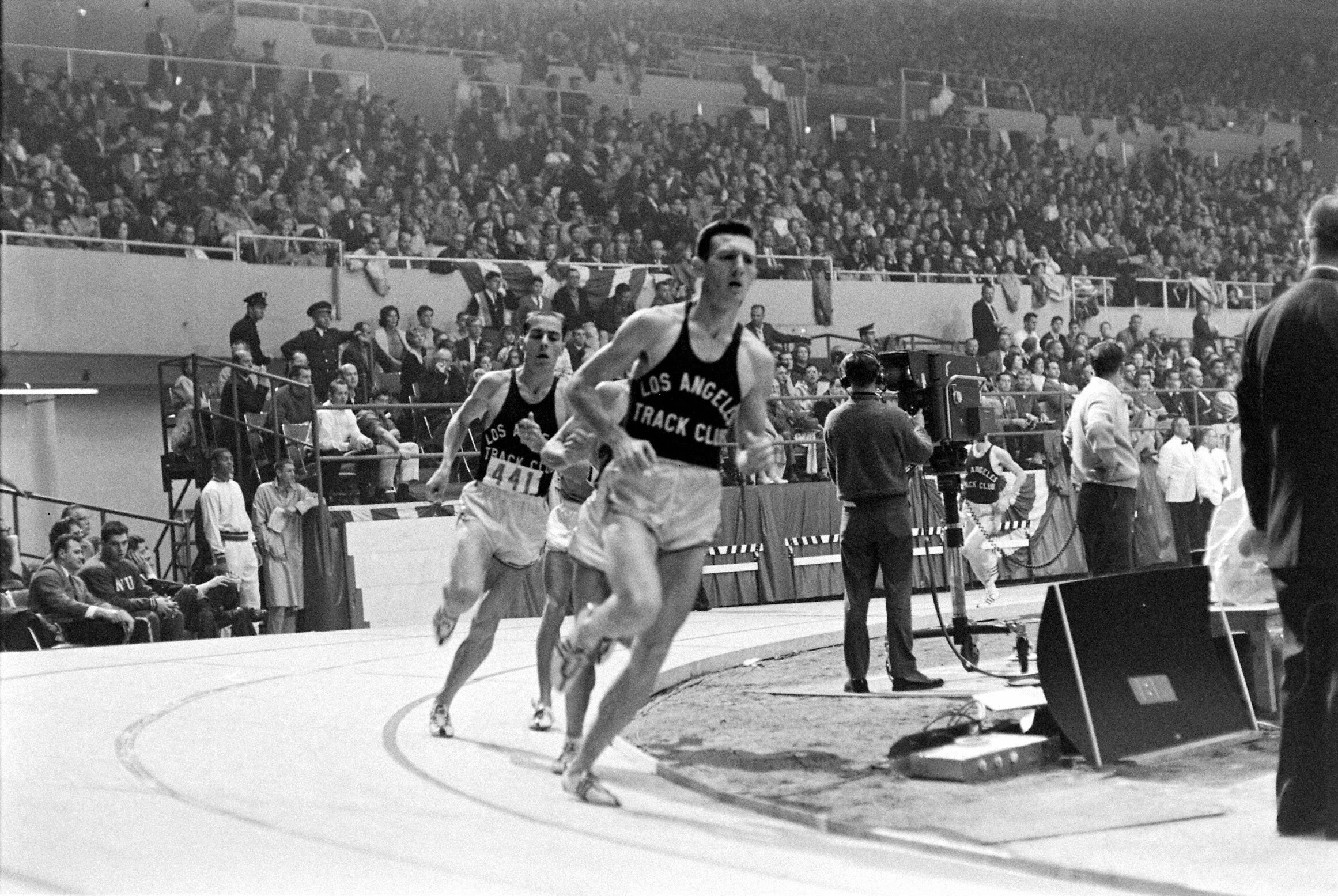  Bob Schul leads the 2-mile race at the Los Angeles Times Indoor Games. 