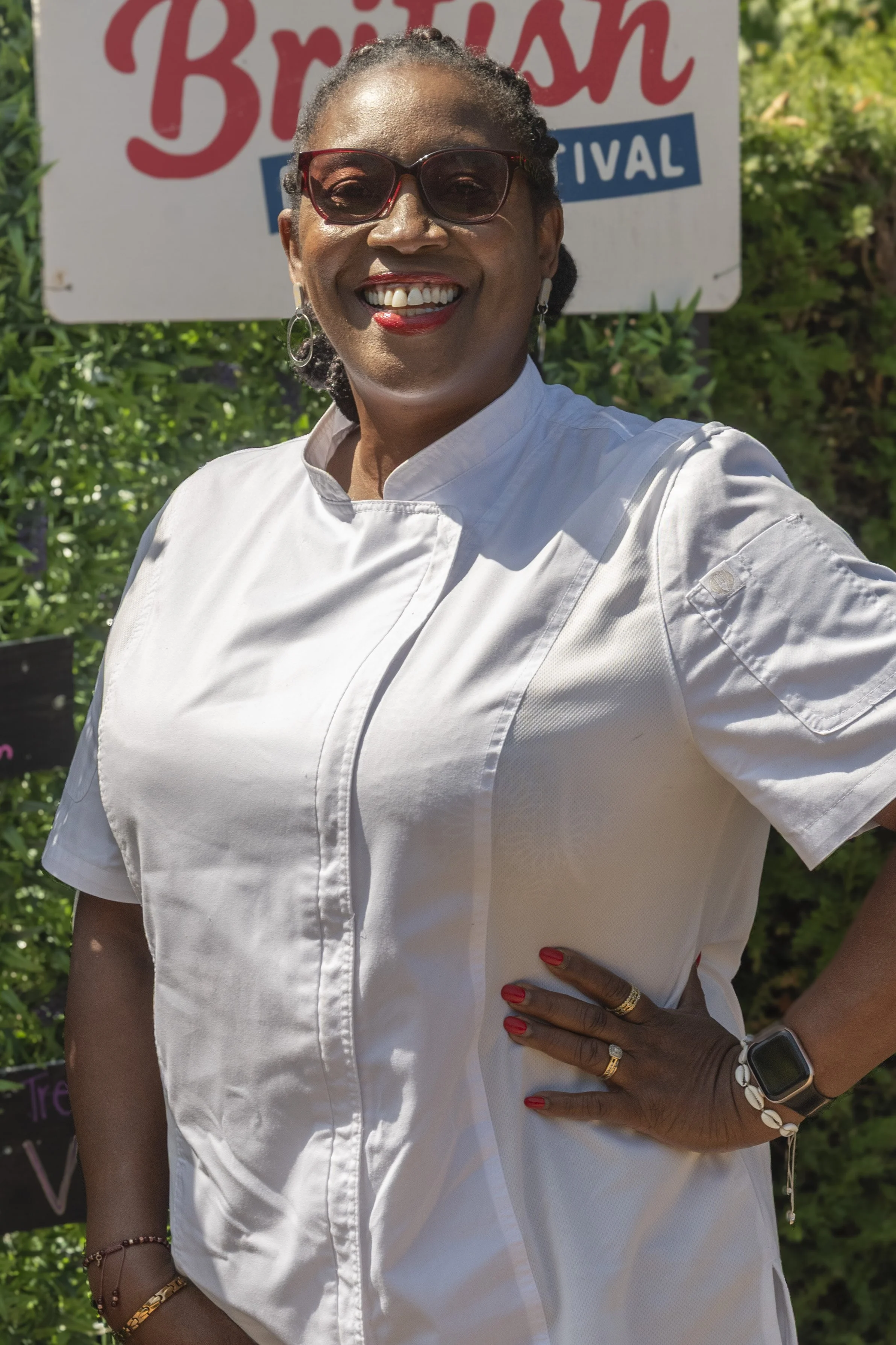 Event food stall vendor demonstrating culinary prep at the Great British Food Festival 