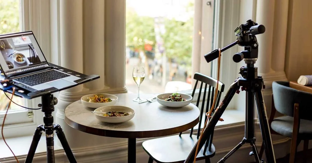 Autumn food photography setup placed near a window with soft side lighting and warm wooden textures.