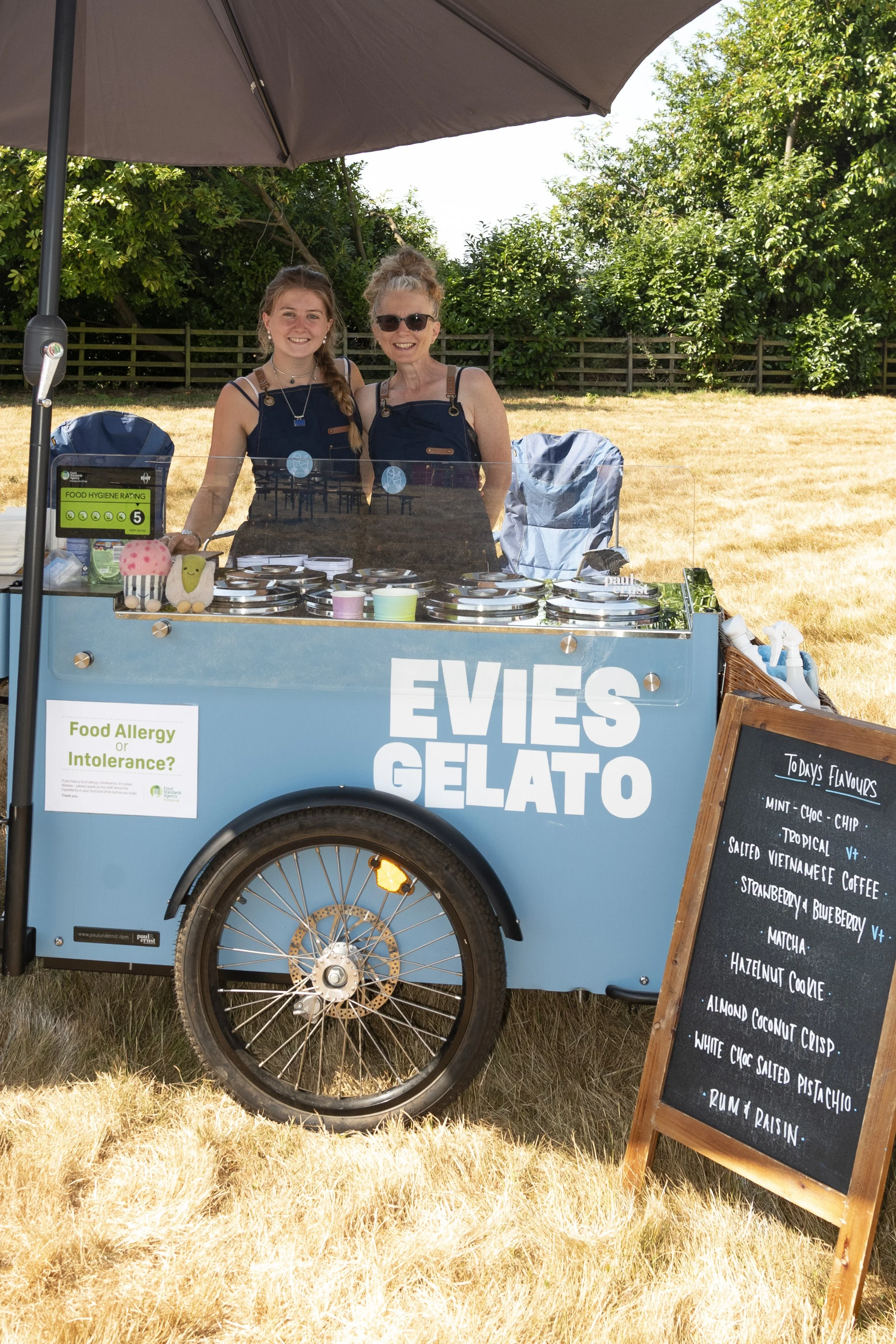 Event food stall vendor demonstrating culinary prep at the Great British Food Festival 