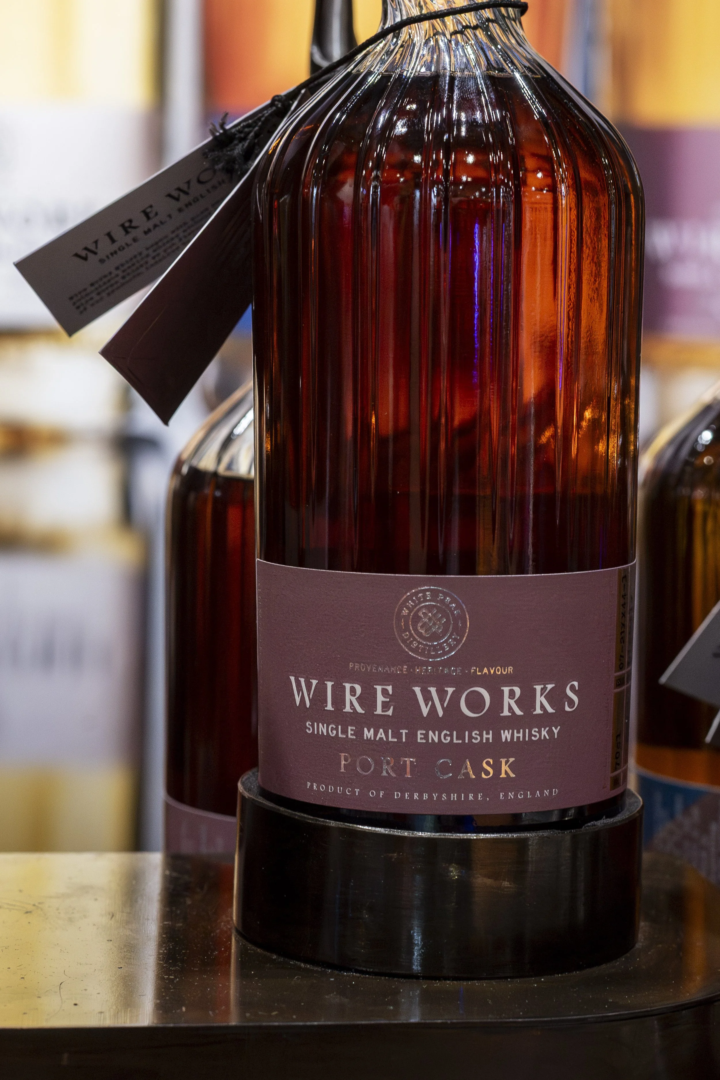 Bottle of Wire Works single malt whisky in a cask-finished dark glass bottle