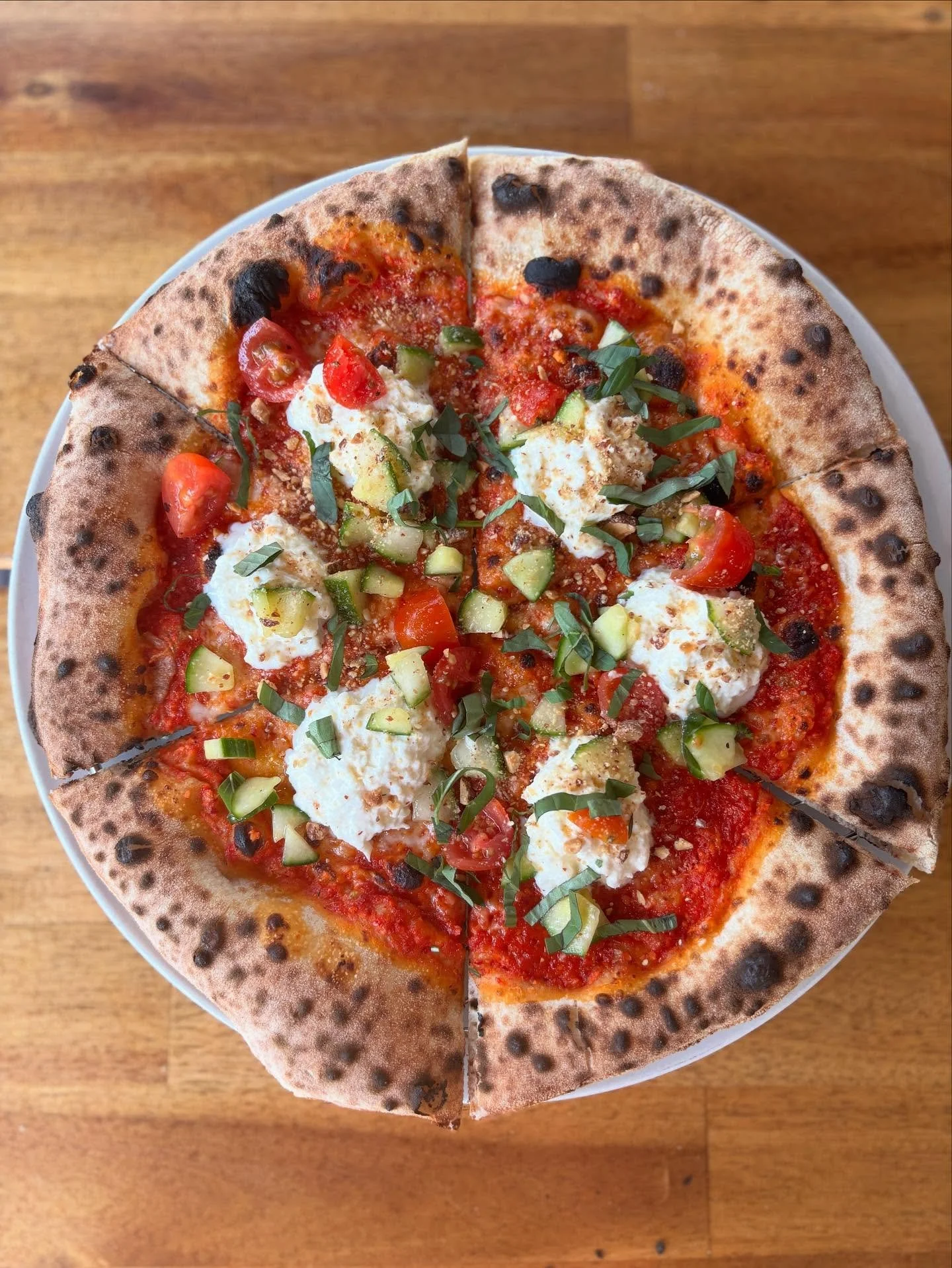 Our Korean Burrata Pizza is back! 👊🏼 iykyk

Our infamous Korean Burrata Salad has made its triumphant return back on pizza! 🎉

// gochugaru spicy red sauce, mozz, creamy burrata cheese, marinated cucumbers and tomatoes, Thai basil, almond crumble*