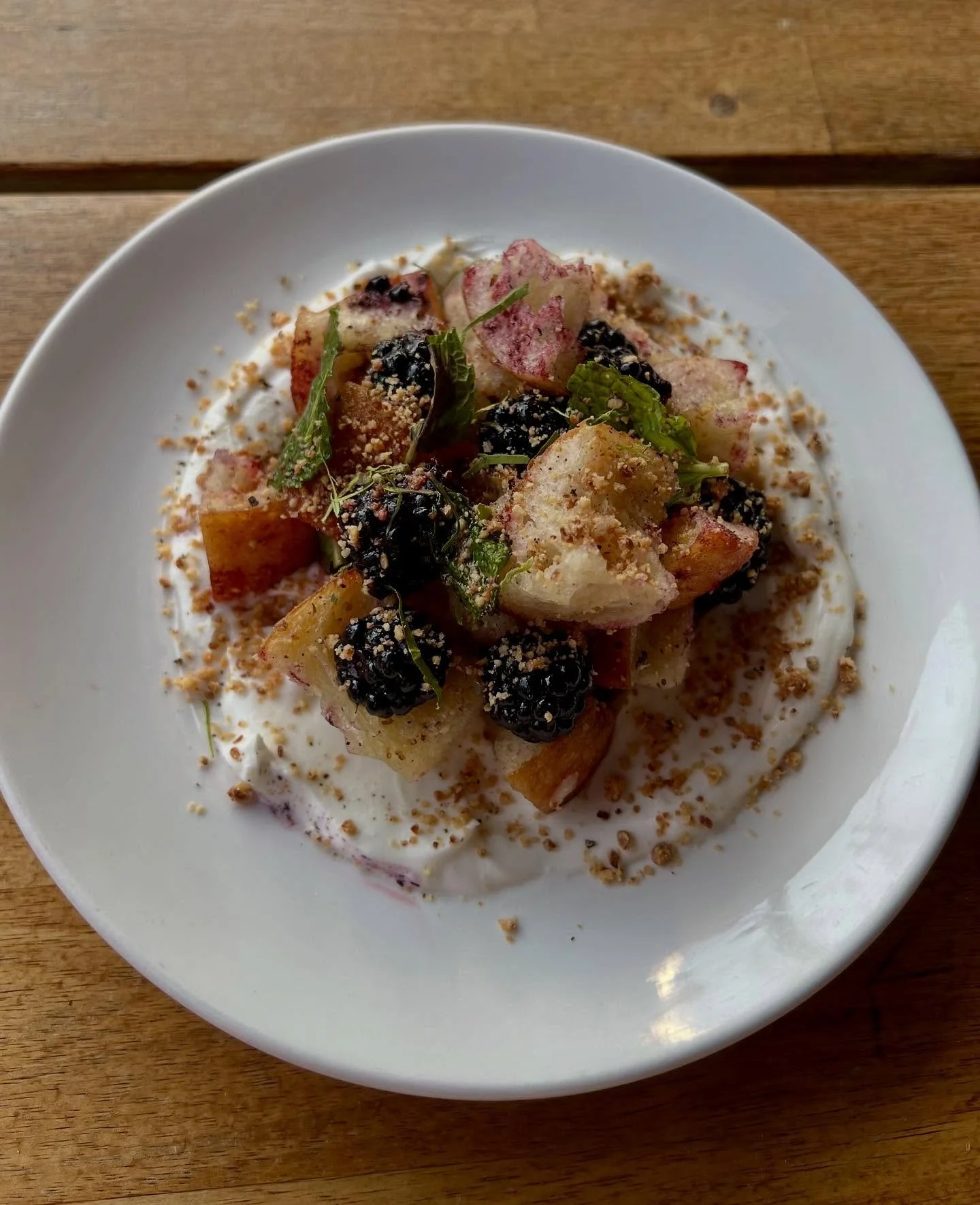 Our newest seasonal salad &mdash; Blackberry Panzanella 

A sweet + savory twist on the classic.

// warm pizza bread, local blackberries, whipped ricotta, nuoc cham, mint, lime leaf, almond crumble. 

For dine in only
*contains dairy, gluten, fish, 