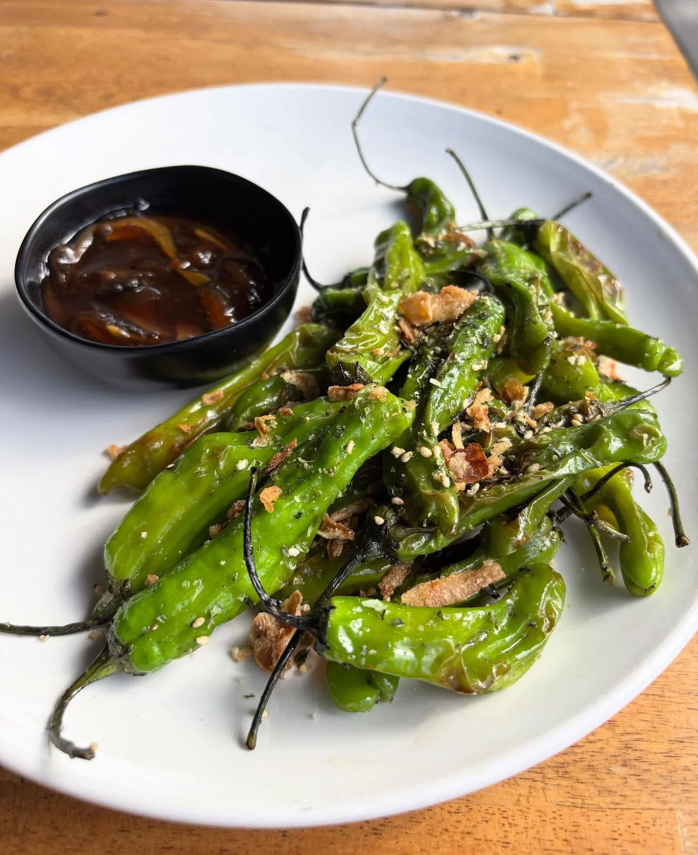 New appetizer to the menu &mdash; Shishito Peppers 🌶️

// Yuzu kosho agrodolce (sweet and sour sauce), local shishito peppers, furikake, fried shallots
*contains sesame

A great vegan/ vegetarian starter option &mdash; the perfect balance of sweet, 