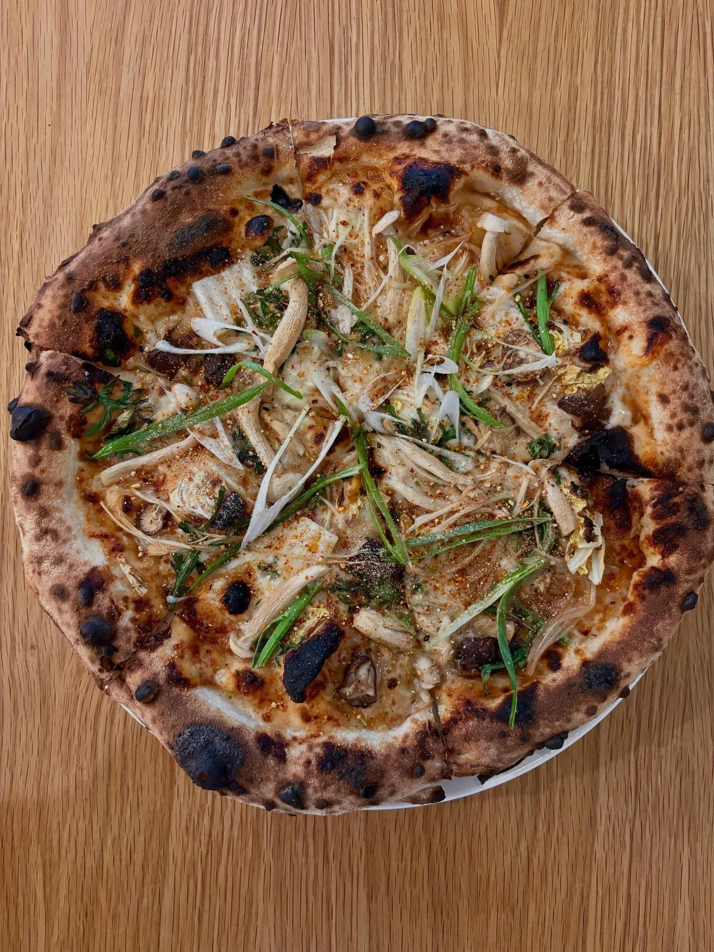 It&rsquo;s soup season! So we&rsquo;re bringing back our Mushroom Sukiyaki Pizza! 🍄&zwj;🟫

// house sukiyaki sauce, mozz, enoki, shimeji, shiitake mushrooms, Napa cabbage, chrysanthemum greens, green onions, roasted rice, togarashi

Full of robust 