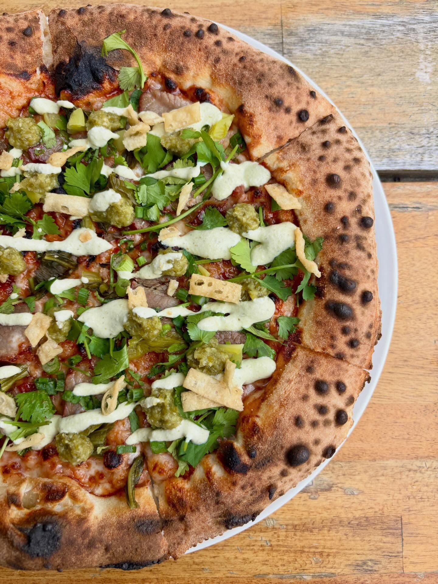 Introducing our newest &mdash; Char Siu Pizza

// char siu, mozz, char siu sauce, pickled gai choy, cilantro, green onions, jalape&ntilde;o sambal, gai choy crema, wonton strips

This one hits every angle &mdash; Sweet, savory, a little spicy, bold a