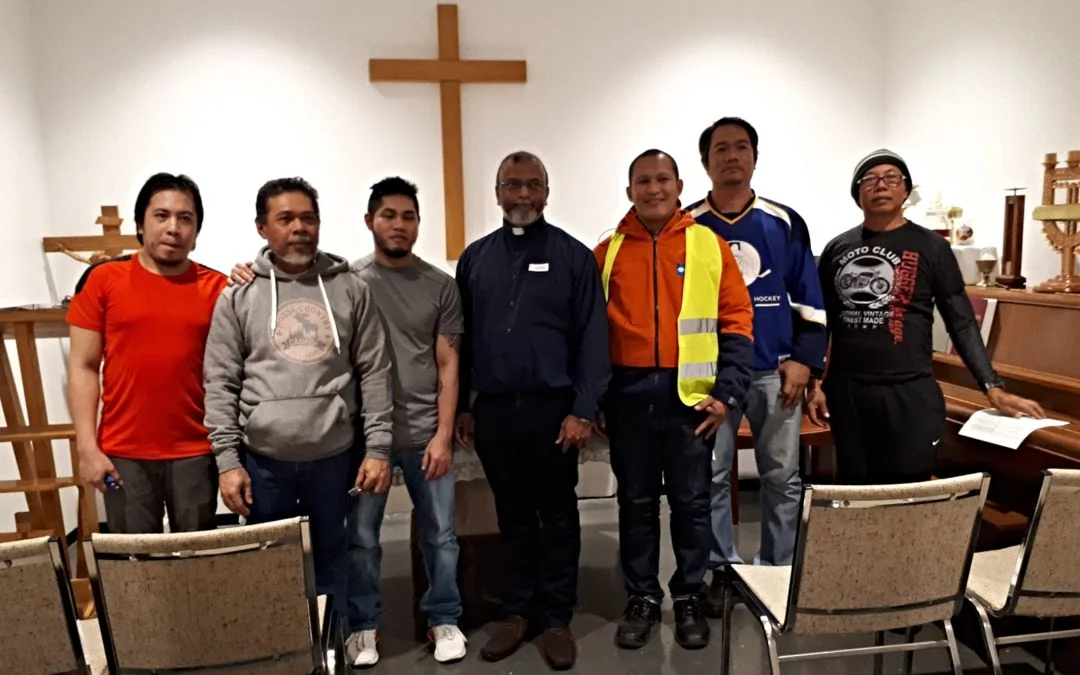 Seafarers attending a Catholic service in the Mariners’ House chapel.