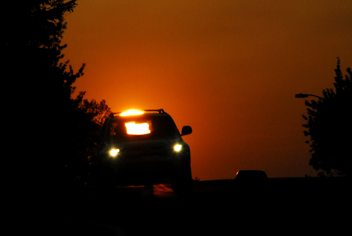Sunrise_Sun_Car_Sunroof_Headlights_Morning_Commute.jpg