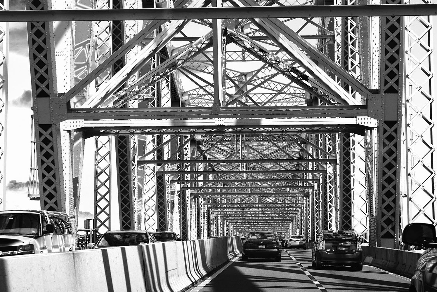Steel_Bridge_Supports_Commute_Traffic_Black-and-White.jpg