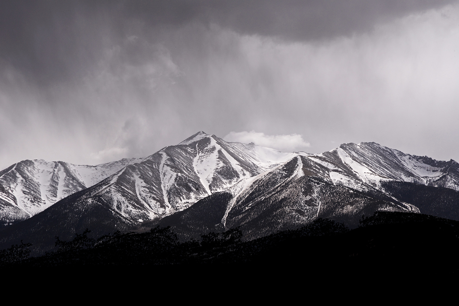 Rocky_Mountains_Rockies_Peaks_Snow_Storm_Colorado_Black-and_White.jpg
